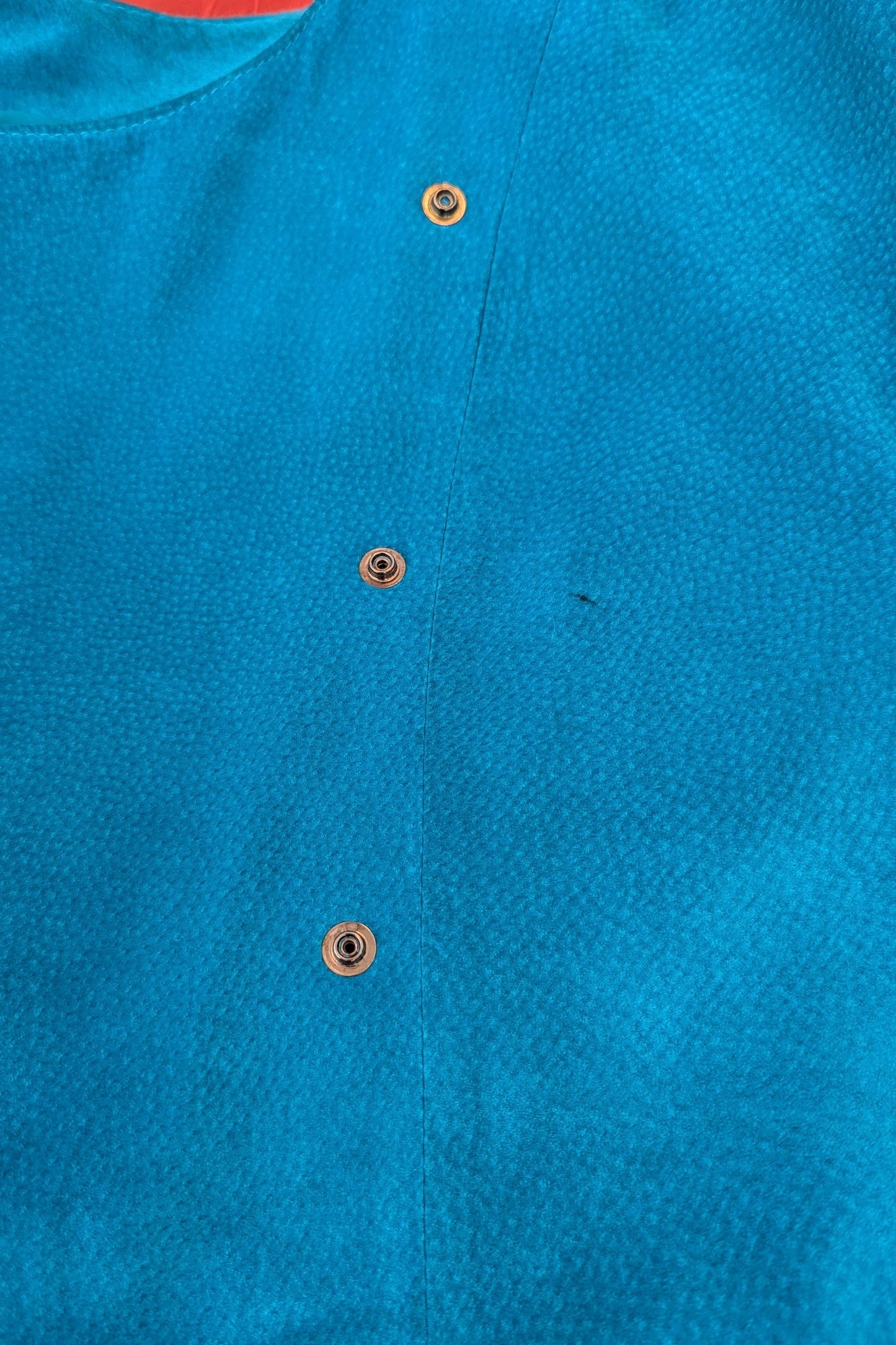 mark on front of 1980s vintage cropped blue suede coat