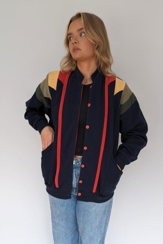 retro jersey cardigan in blue with red, yellow and green panelling
