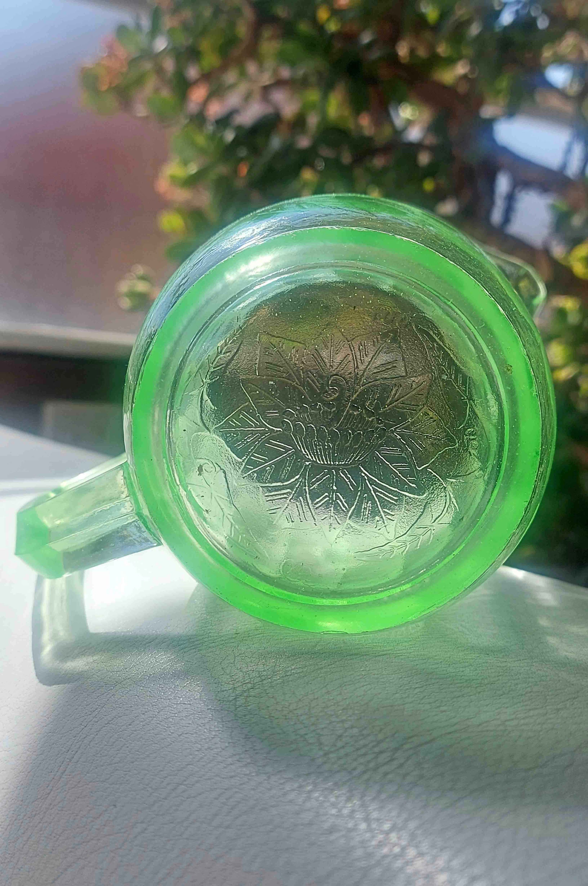 Rare green uranium glass poinsettia milk pitcher