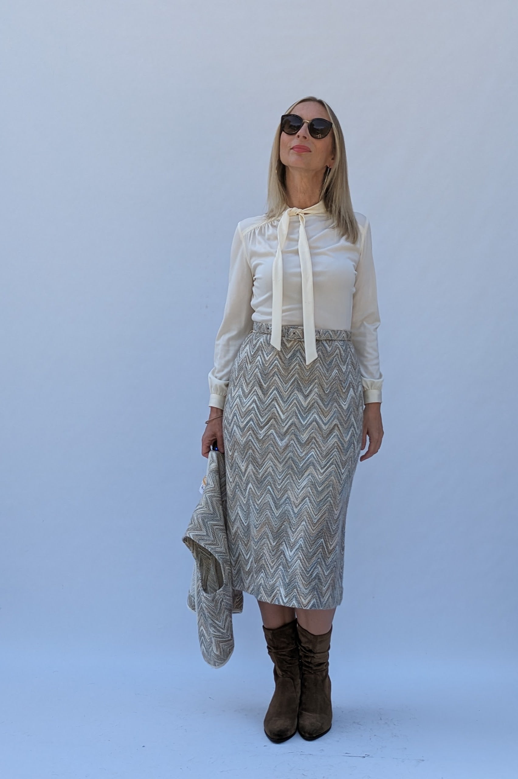 1970s cream top and woven skirt dress with waistcoat in hand