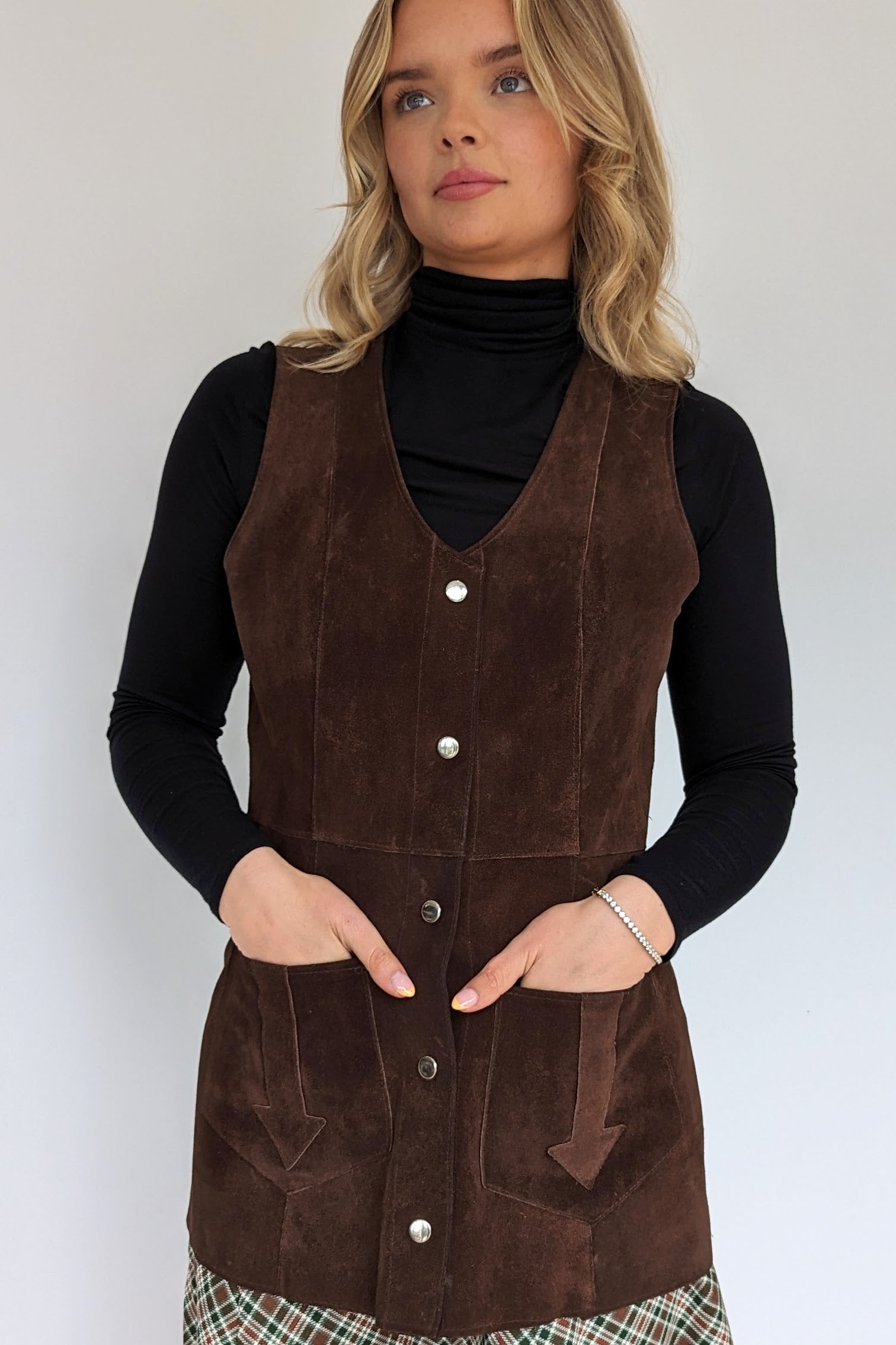 vintage dark brown ladies 1970s waistcoat  done up with poppers