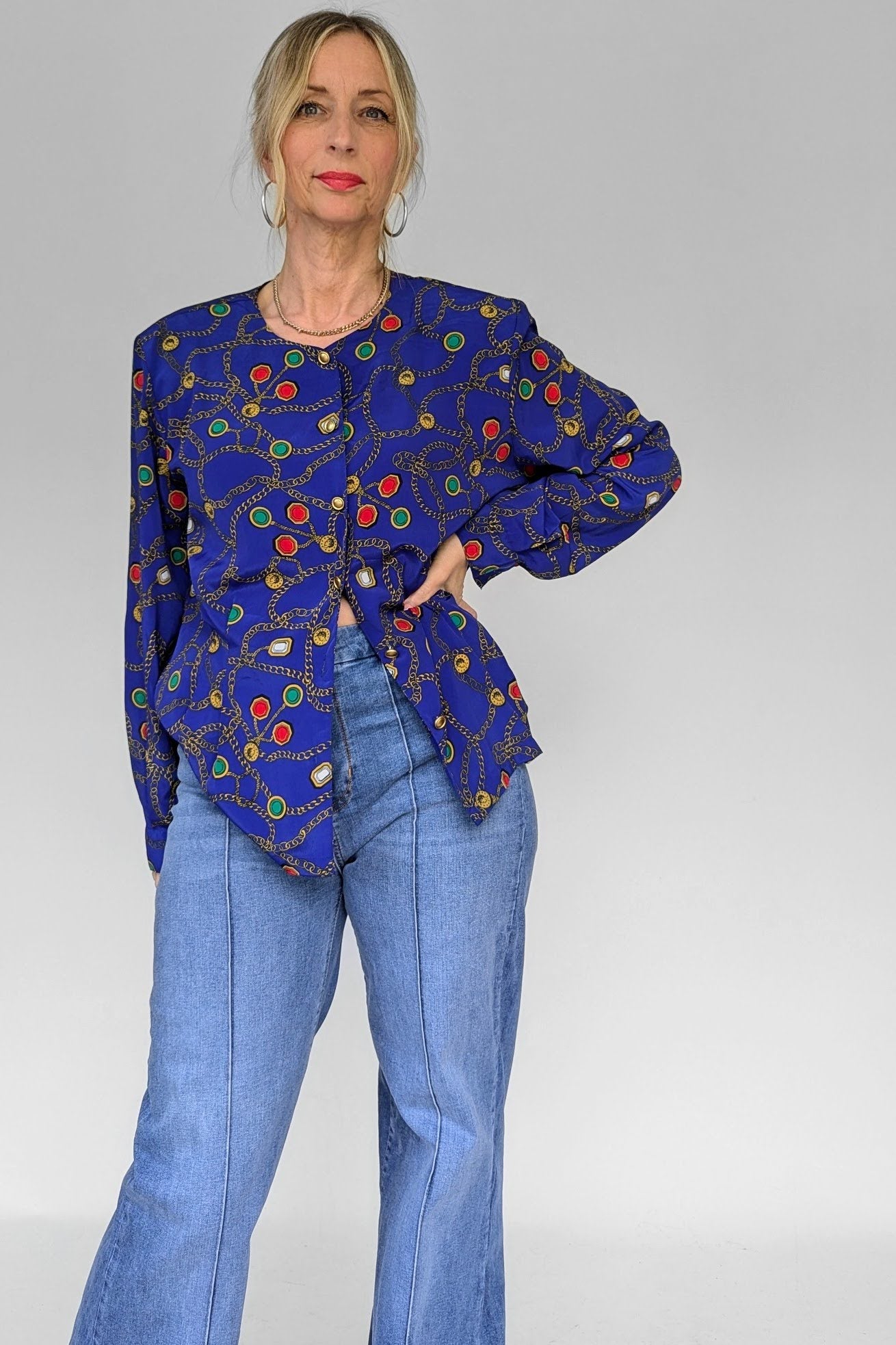 1980s vintage blue chain print blouse undone