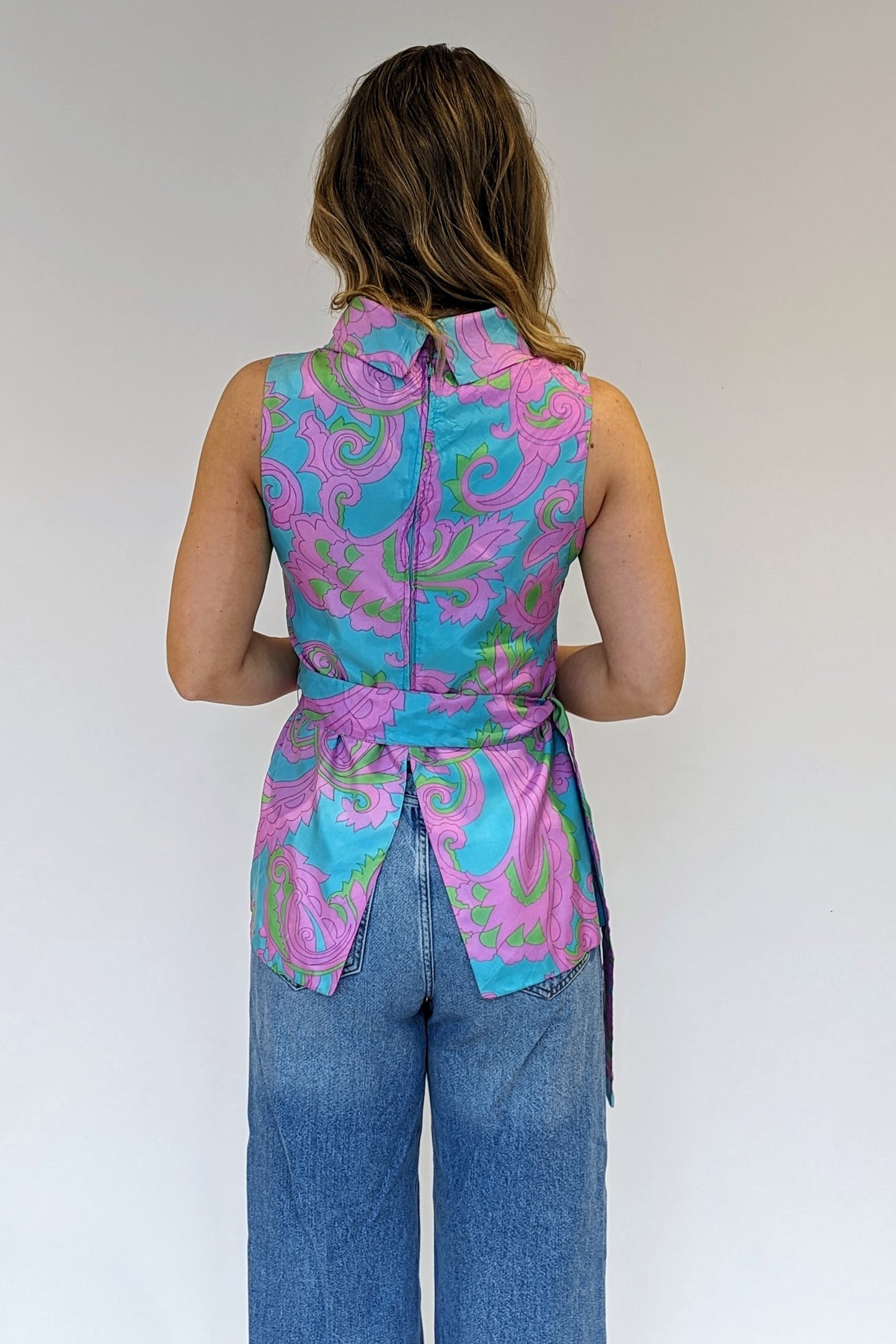 Pastel patterned vintage ladies sleeveless top with tie belt