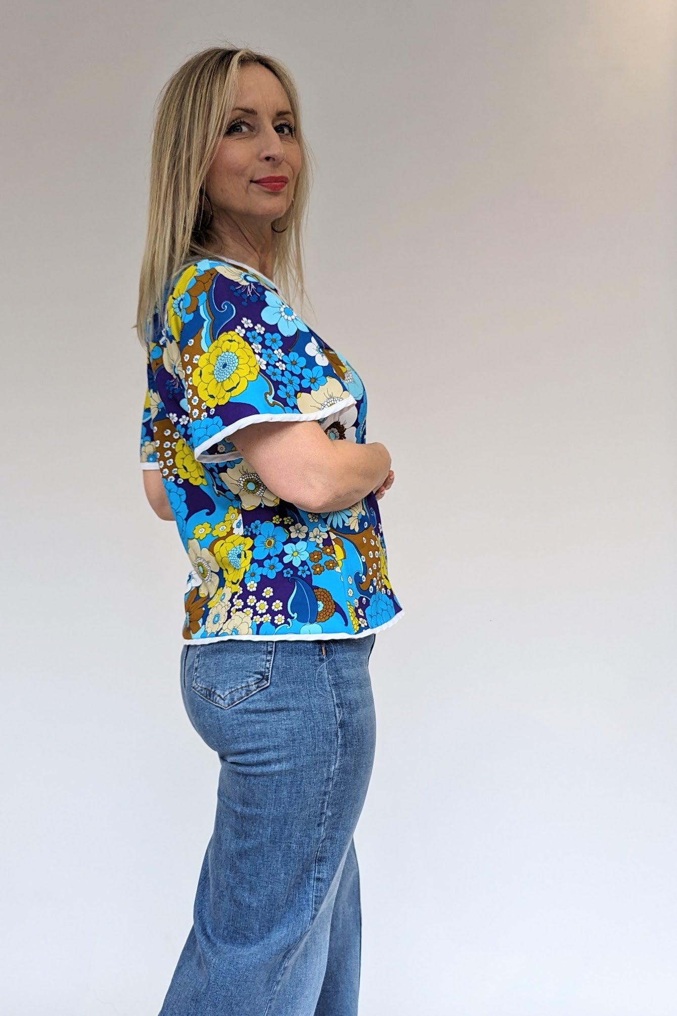 side view of vintage floral bright short sleeve top