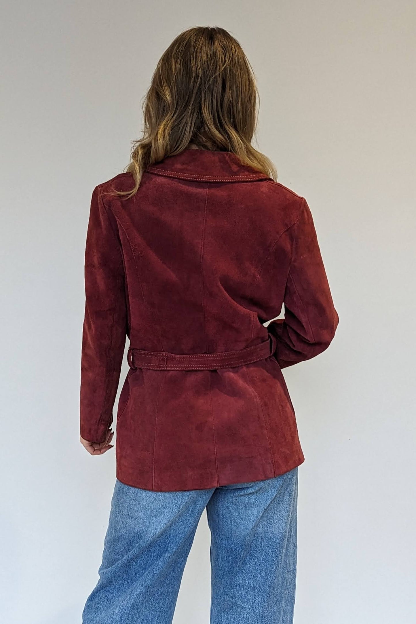 back of red vintage suede coat 