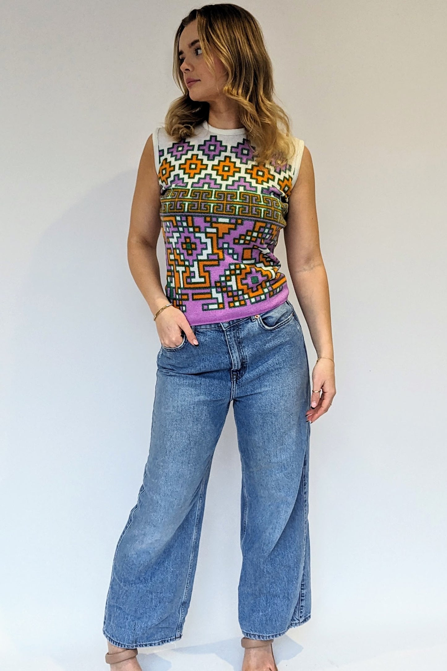 1970s short top with geometric pattern in green, orange and purple