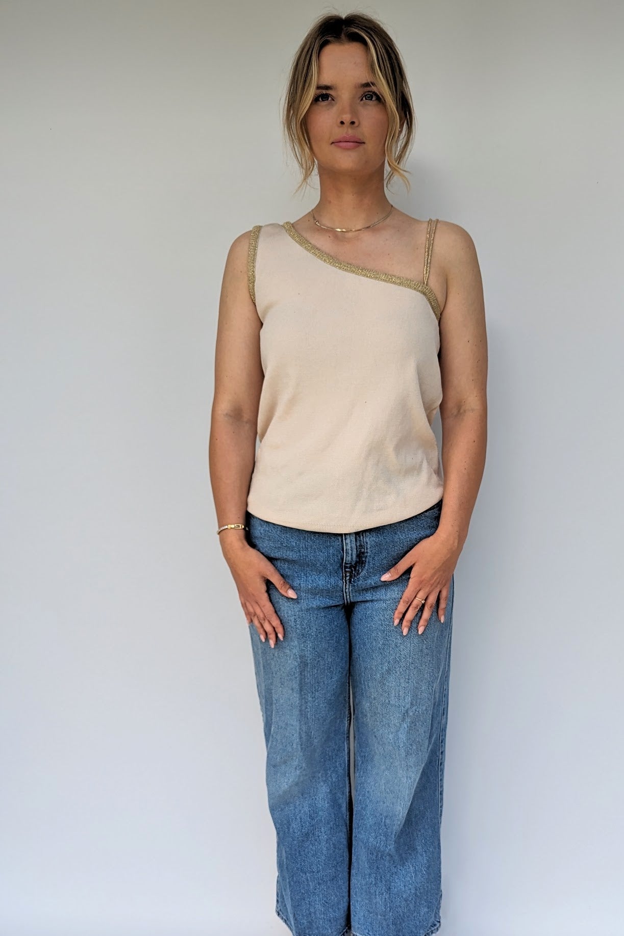 cream one shoulder deadstock 1970s top with gold trim vintage