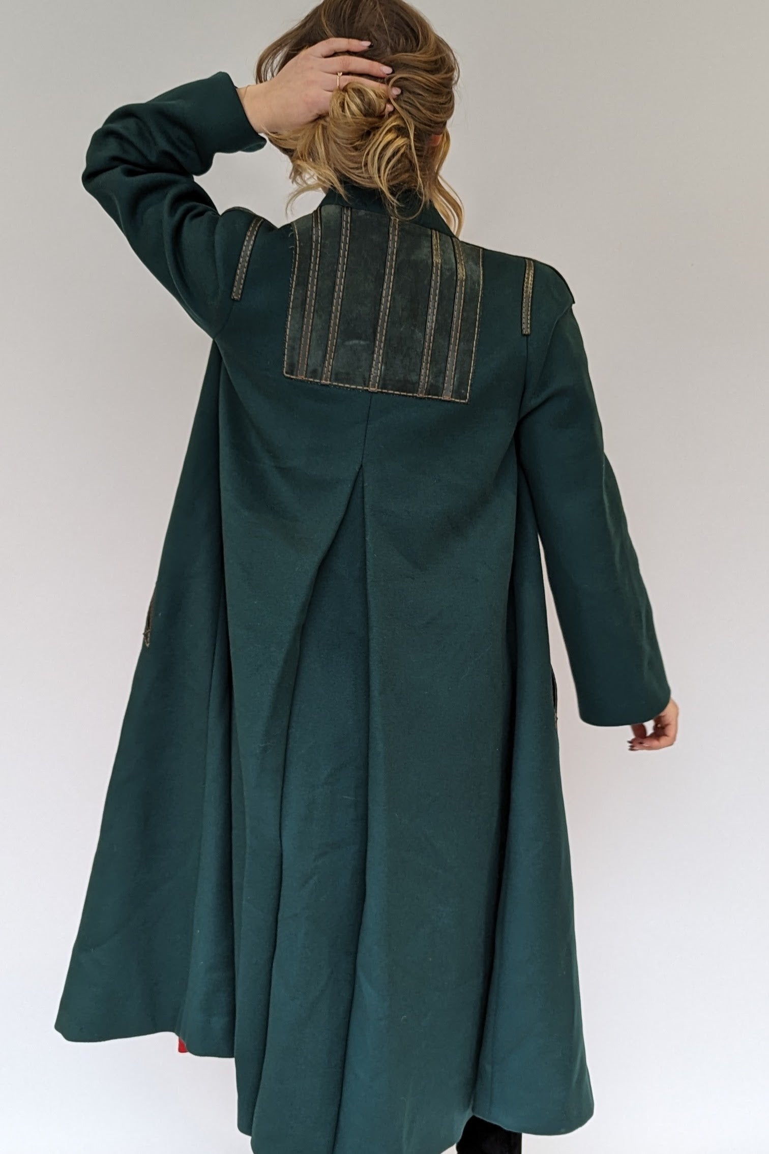 hack of green wool vintage coat with suede panel detail