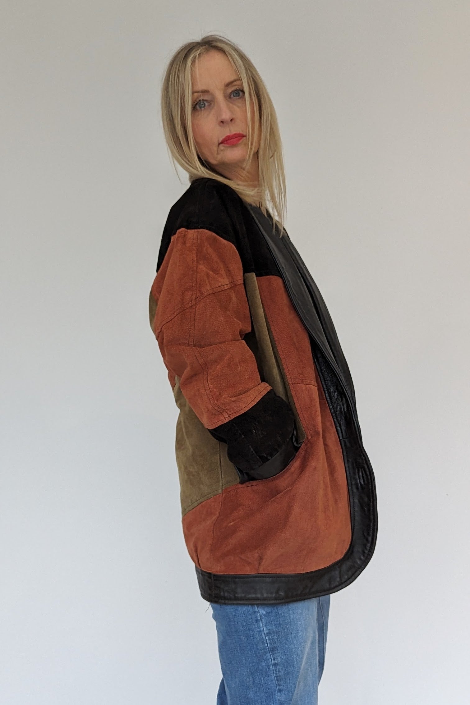 side of Oversized Suede Patchwork Ladies Jacket in Khaki, Black and Russet with pockets