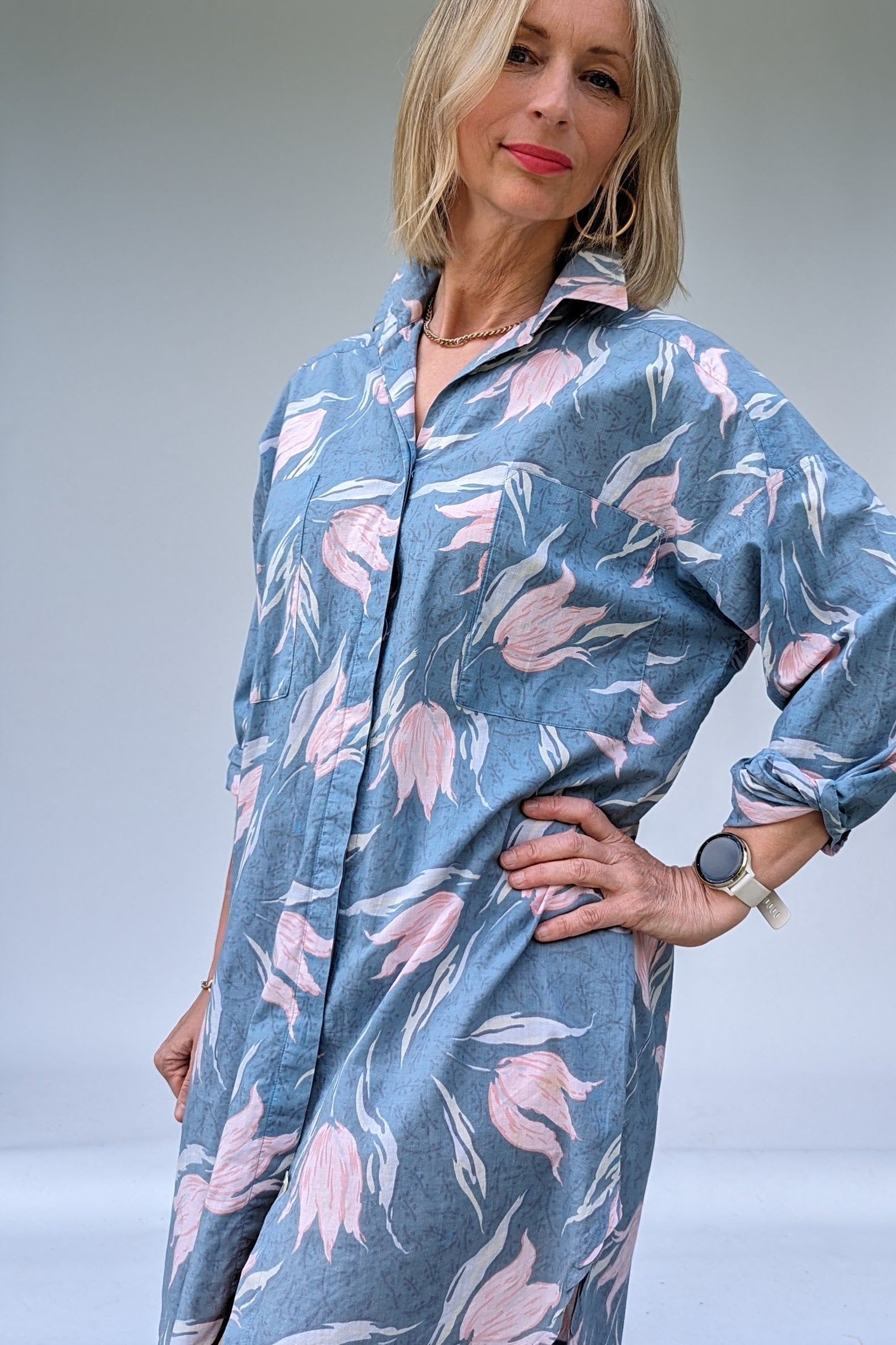 front of laura ashely shirt dress 80s vintage in grey pink and cream floral pattern