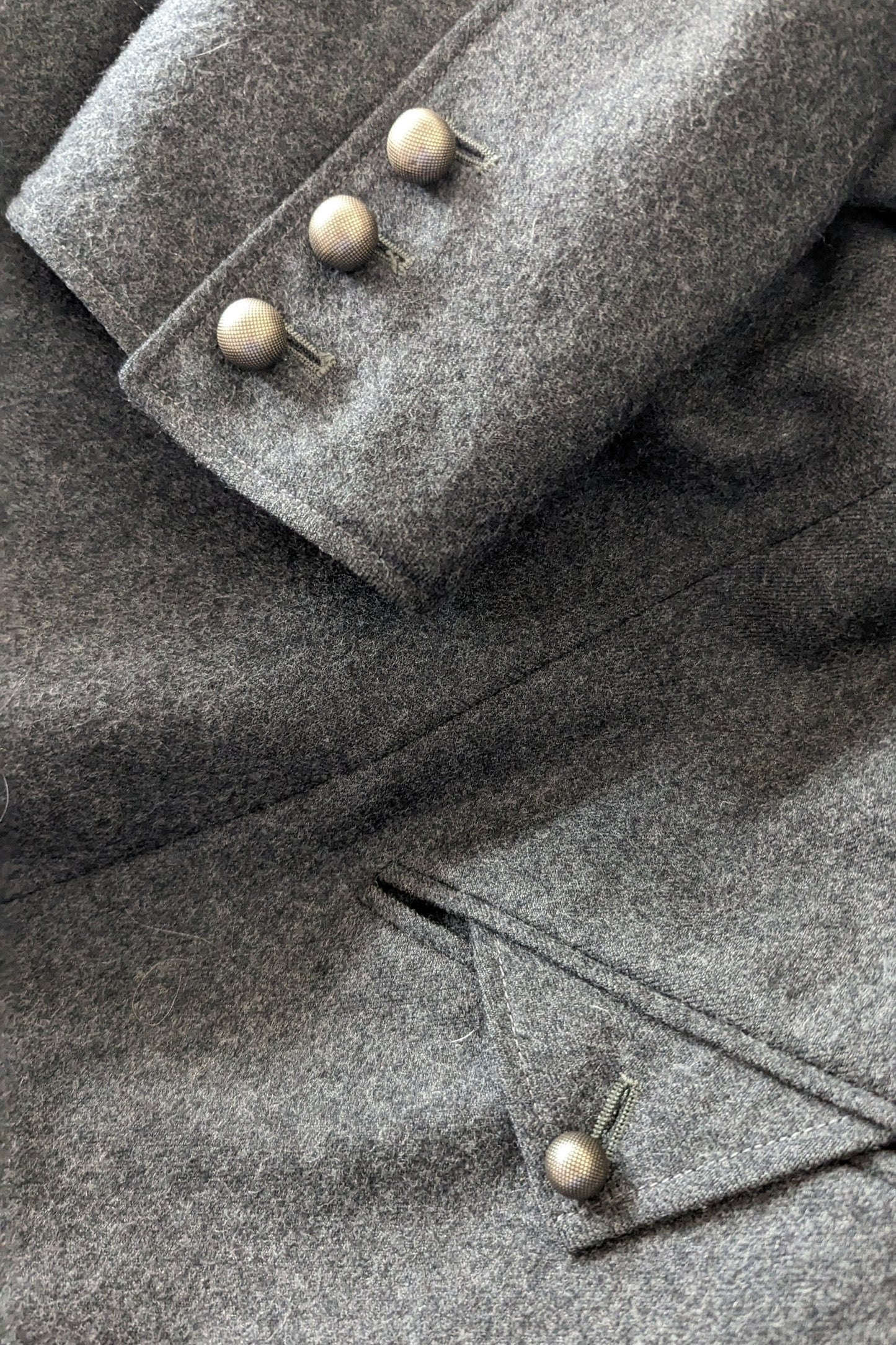 Sliver buttons on Louis Feraud coat