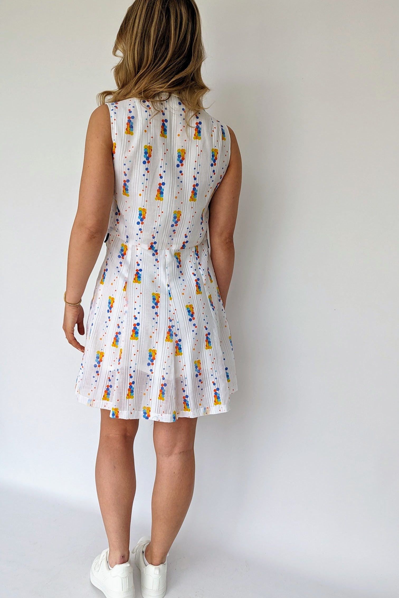 back of vintage 60s mini dress white with coloured spots and dagger collar