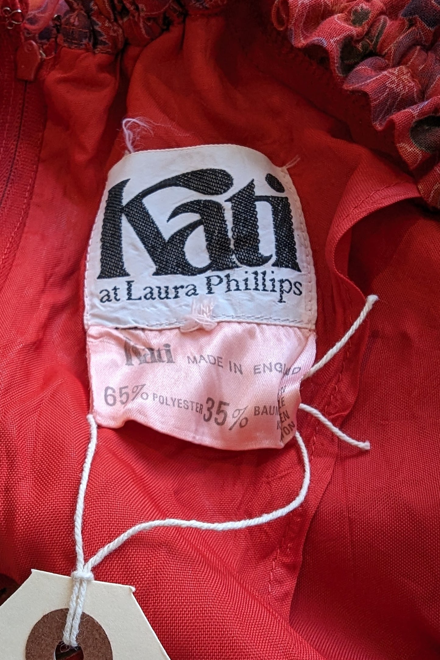 Kati at Laura Phillips Label on Red 70s Dress