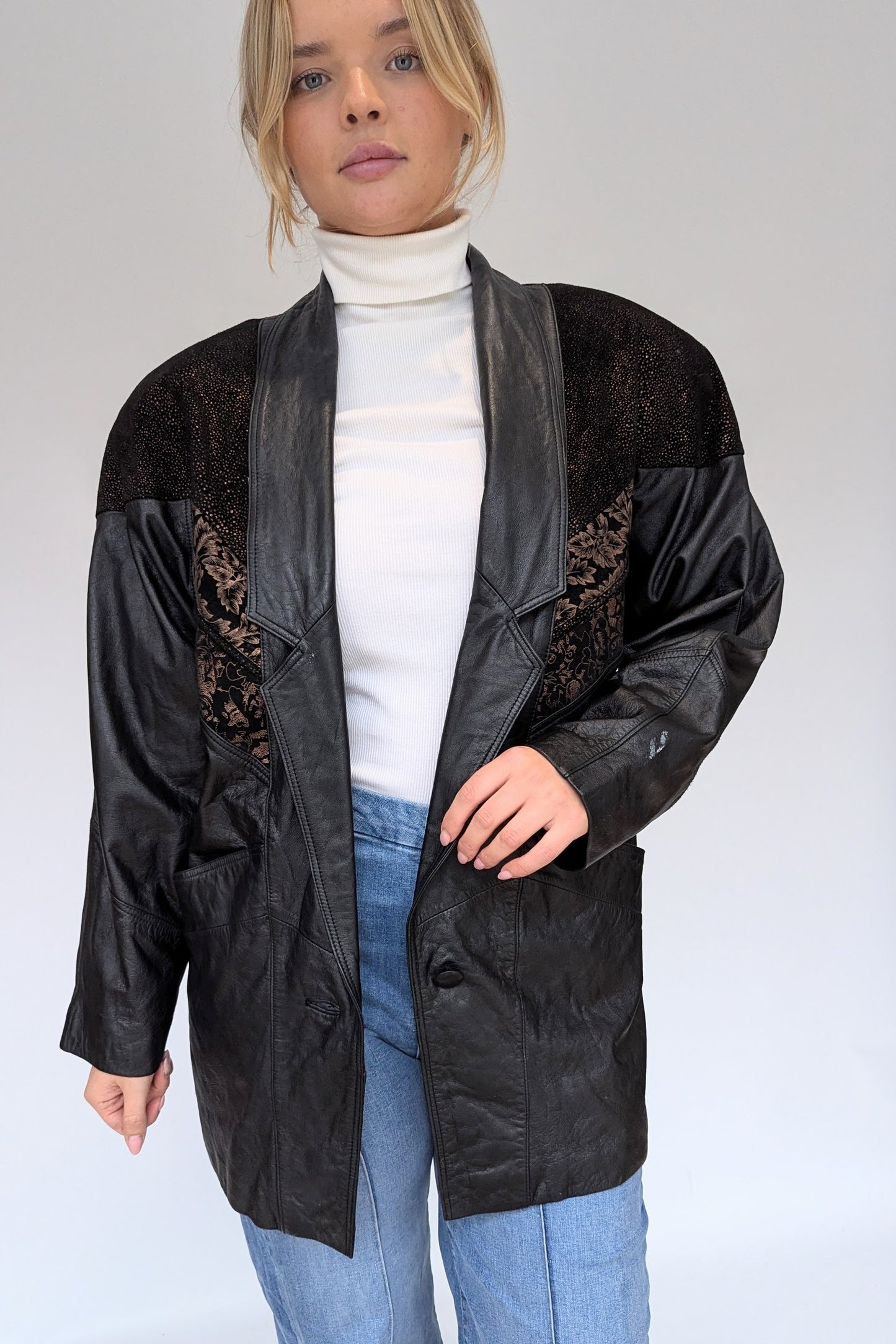 Vintage Black Leather Jacket with Bronze Suede Embellishment