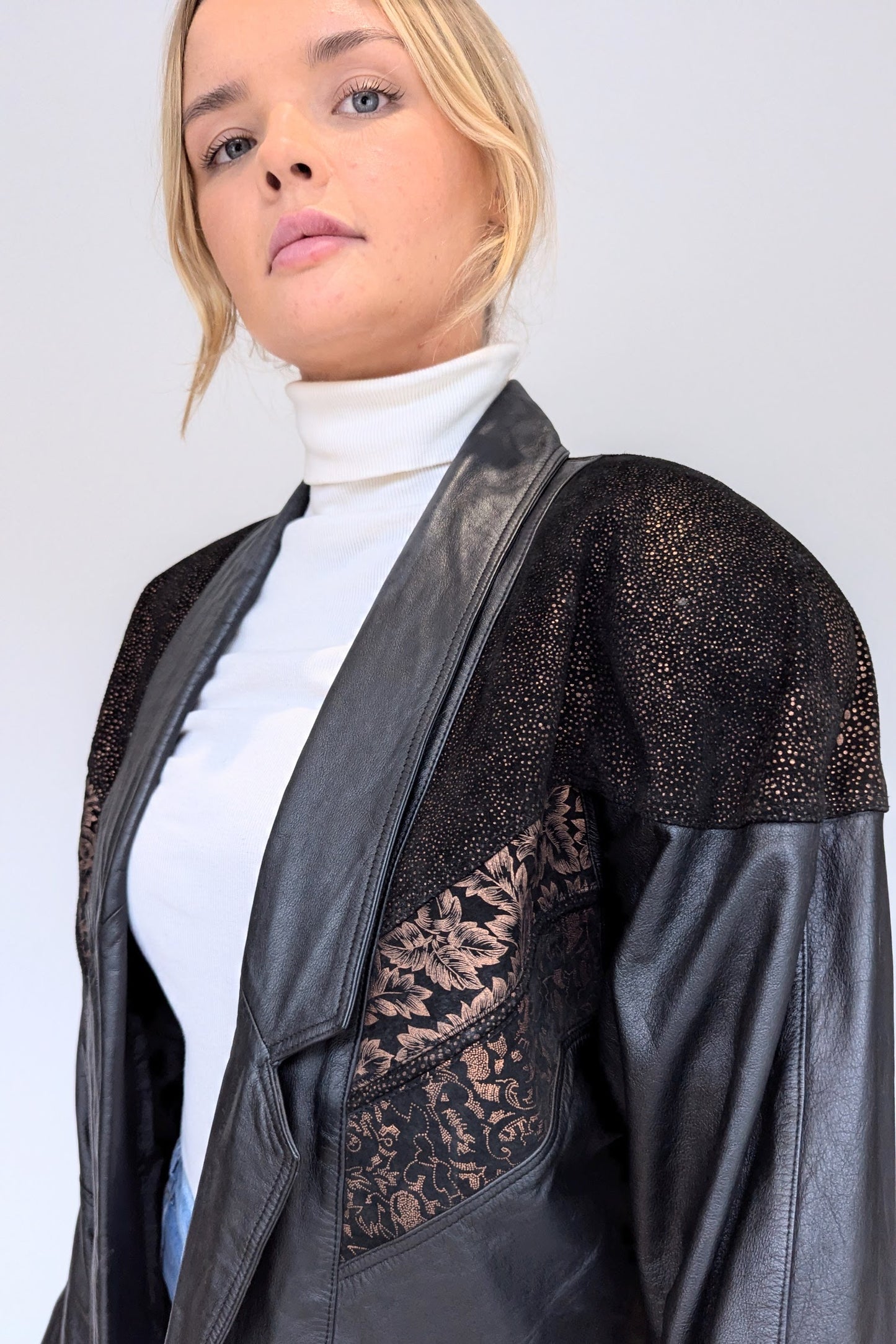 Vintage Black Leather Jacket with Bronze Suede Embellishment