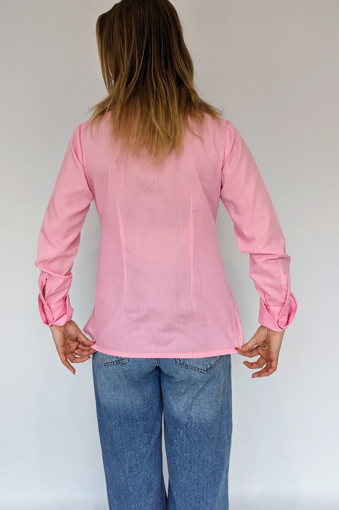 back full length of 70s pink dagger collar long sleeve shirt