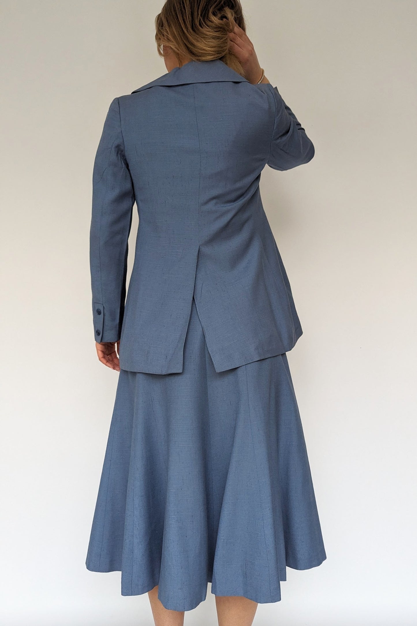 Back of 1960s louis Feraud two piece blue suit with skirt