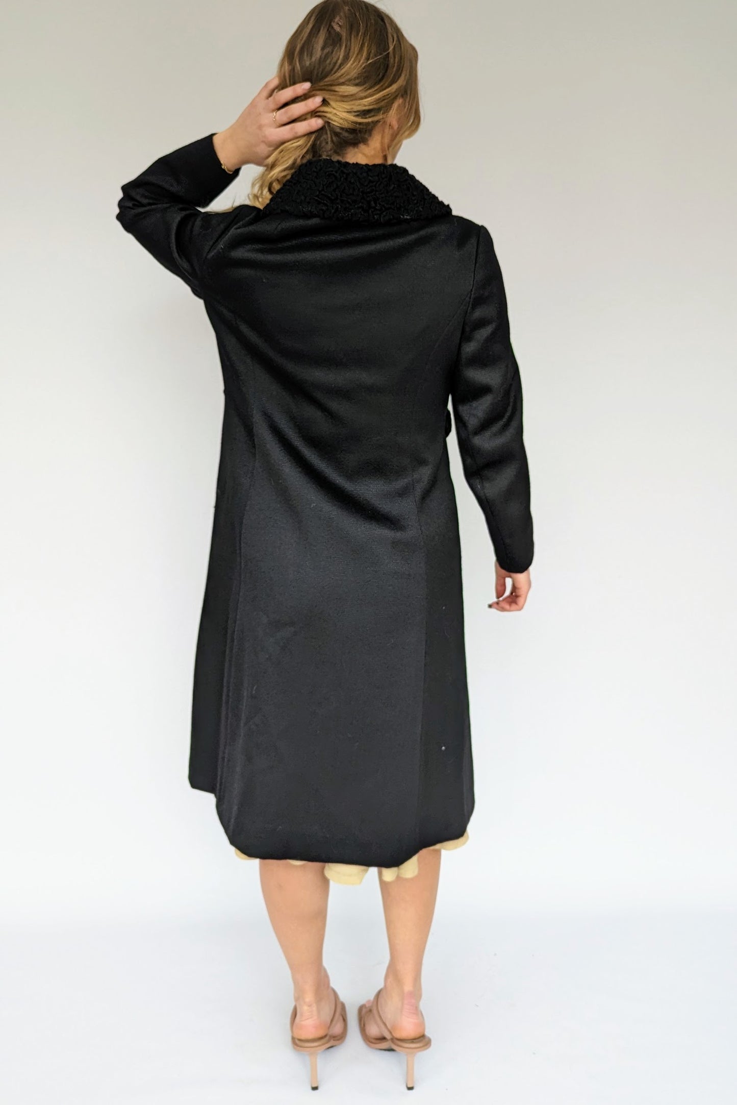 back of 60s vintage black vintage wool coat