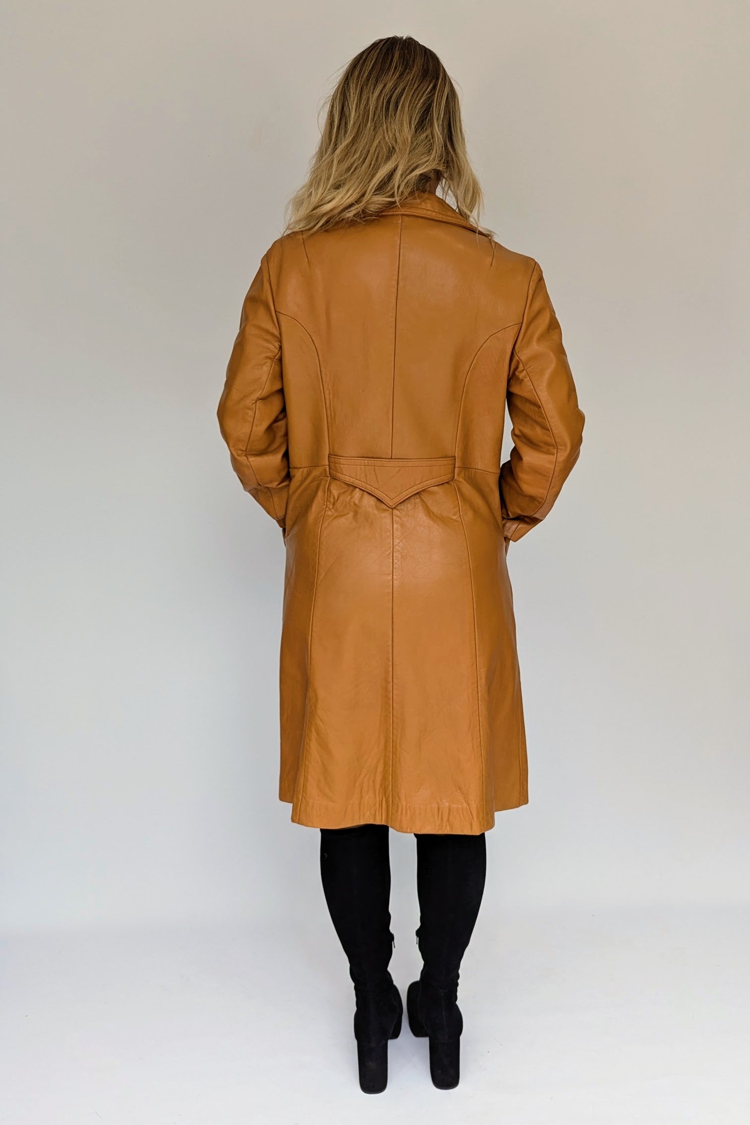 back of brown tan 1970s leather trench coat