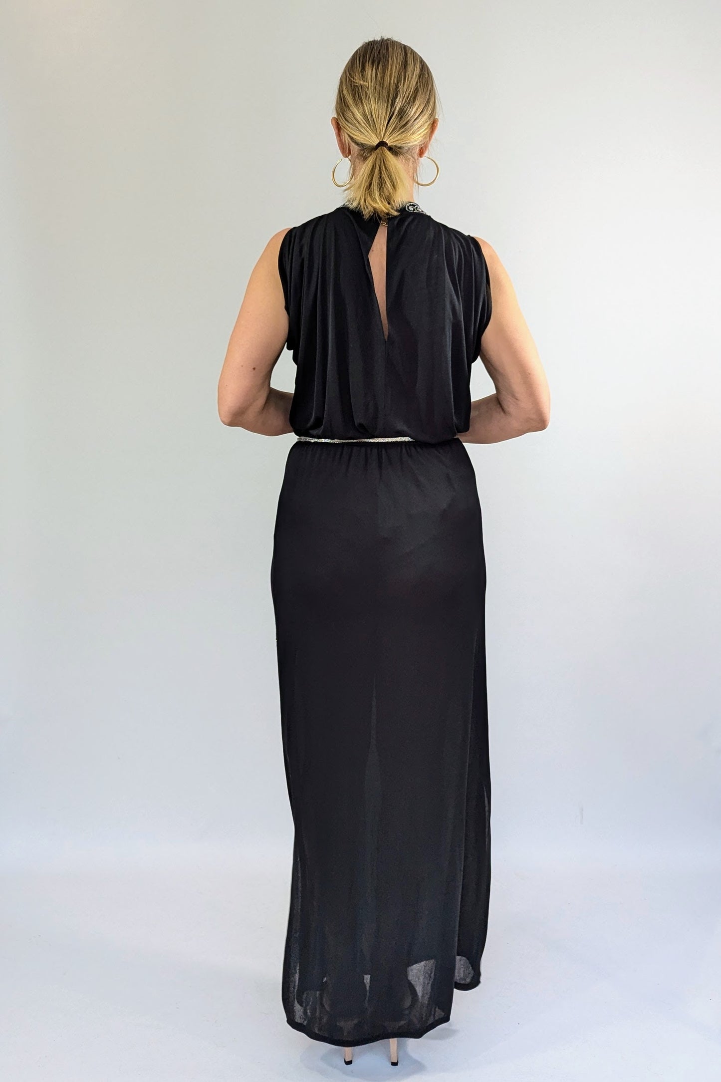 back of side view of silver of 70s radley vintage dress