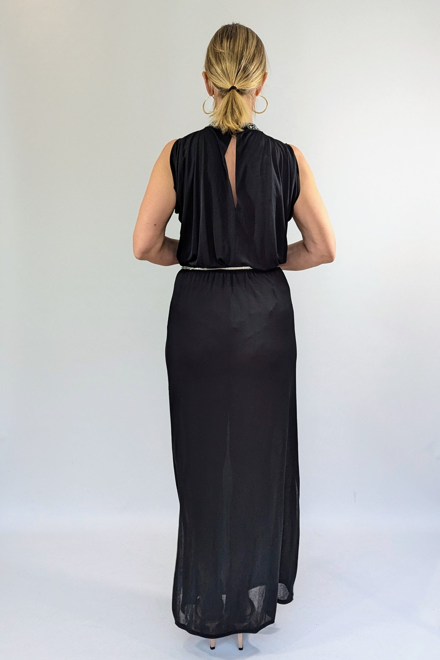 back of side view of silver of 70s radley vintage dress