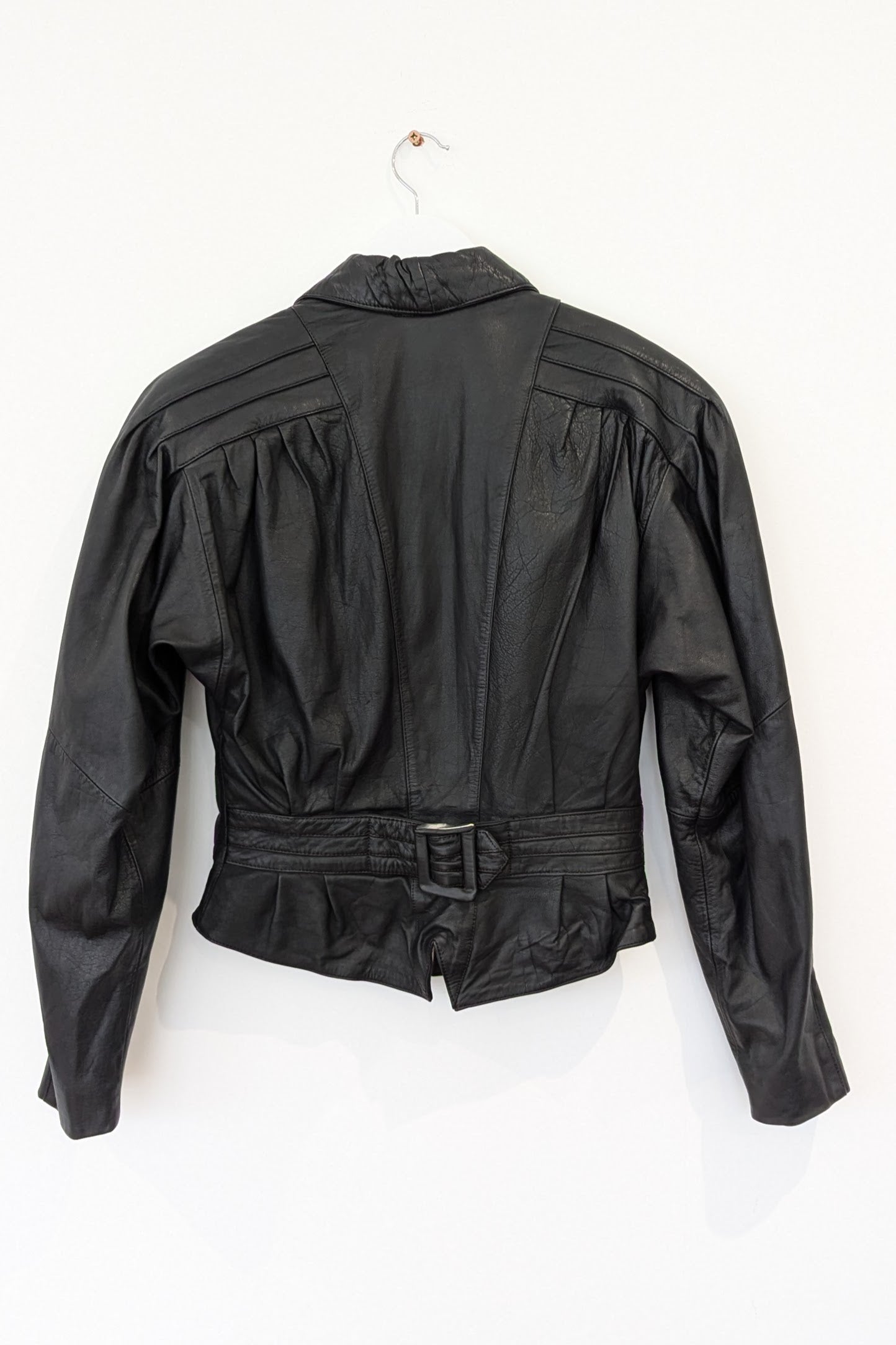 back of vintage leather black 80s jacket