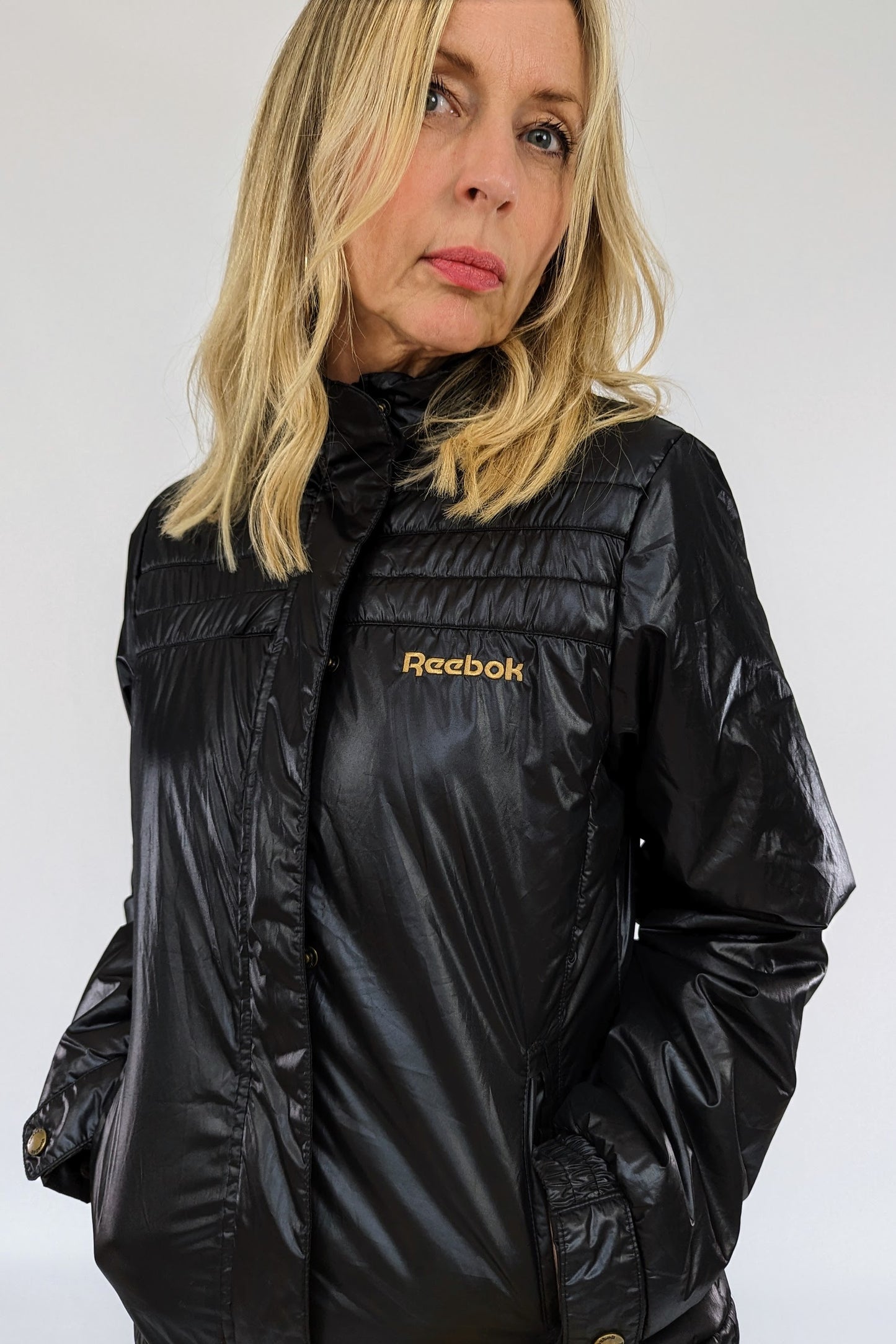 front of black puffer reebok jacket 