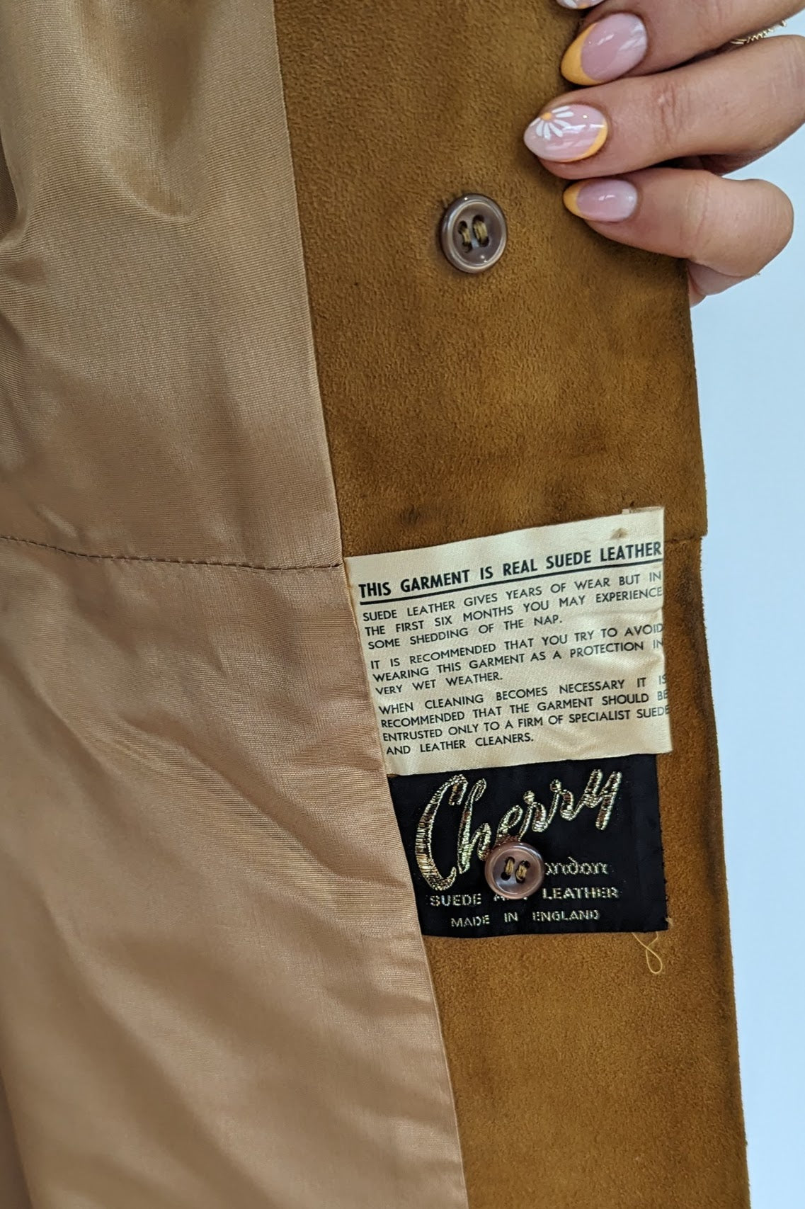 cherry of london vintage label on suede coat