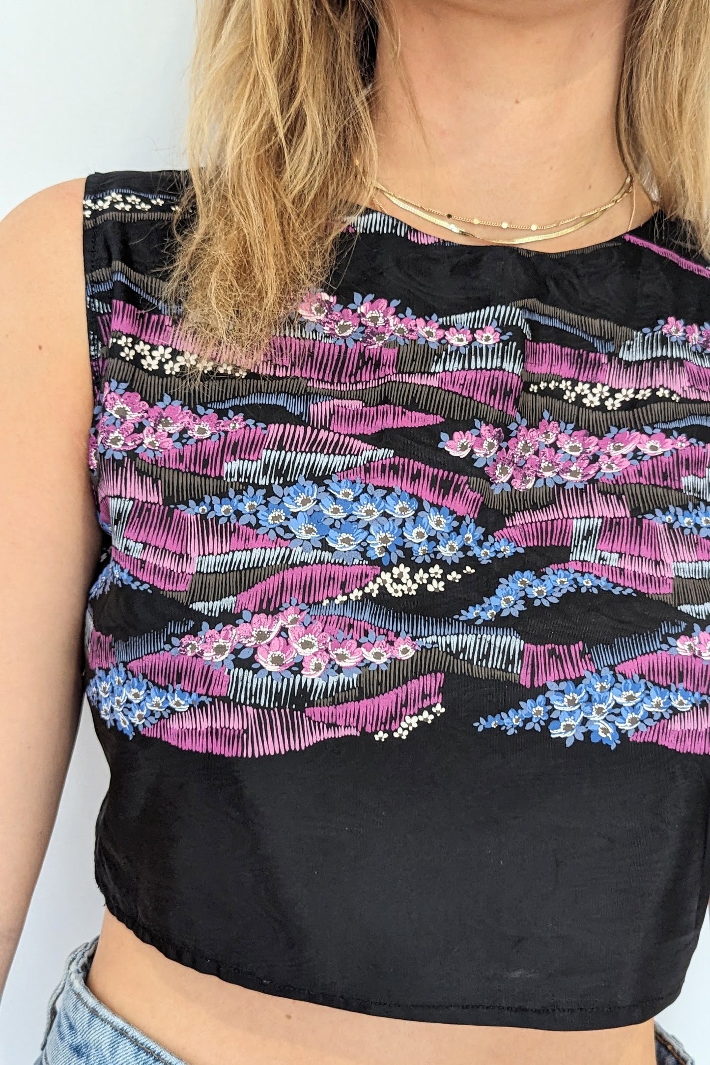 floral pattern on black cropped top