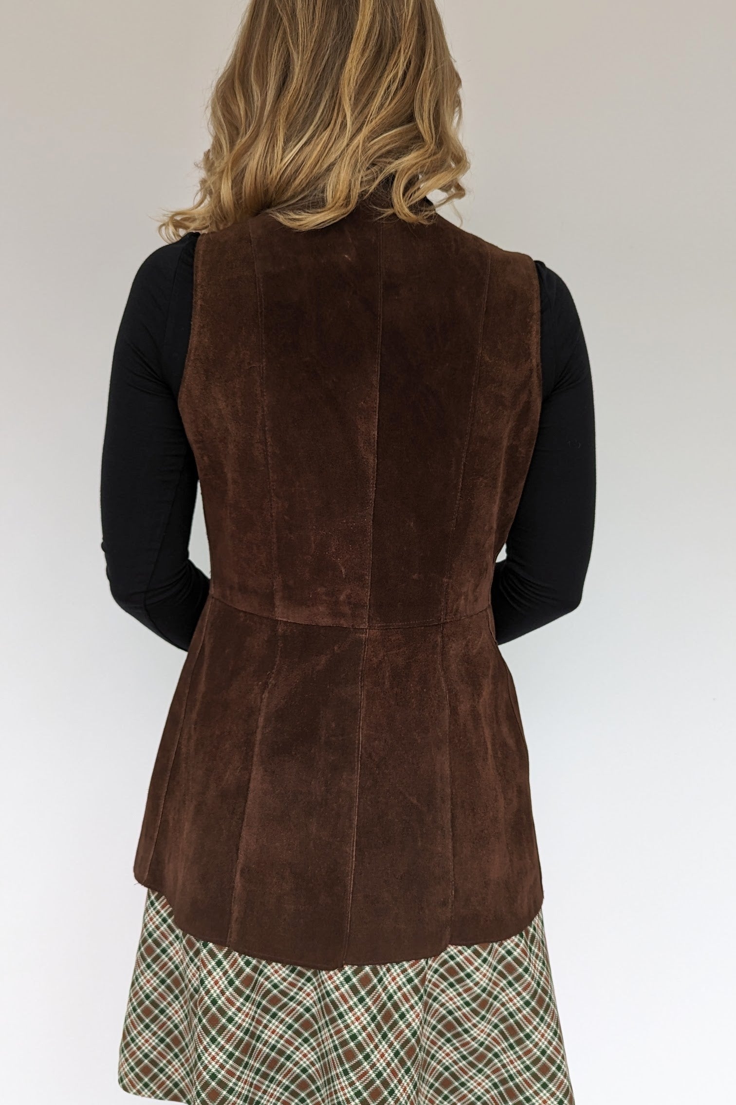 back of vintage dark brown retro ladies waistcoat 