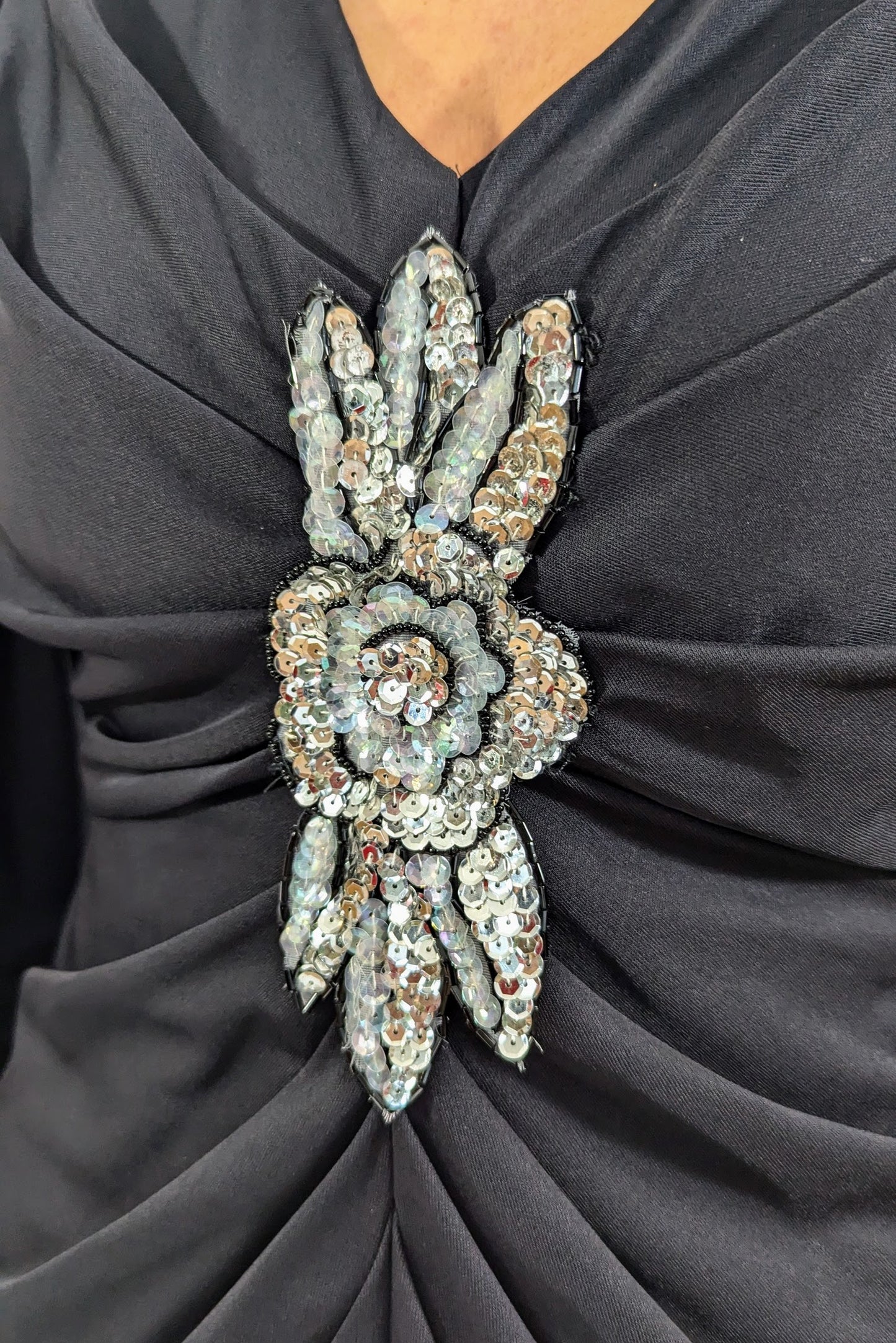embellishment on black zandra rhodes vintage 80s cocktail dress