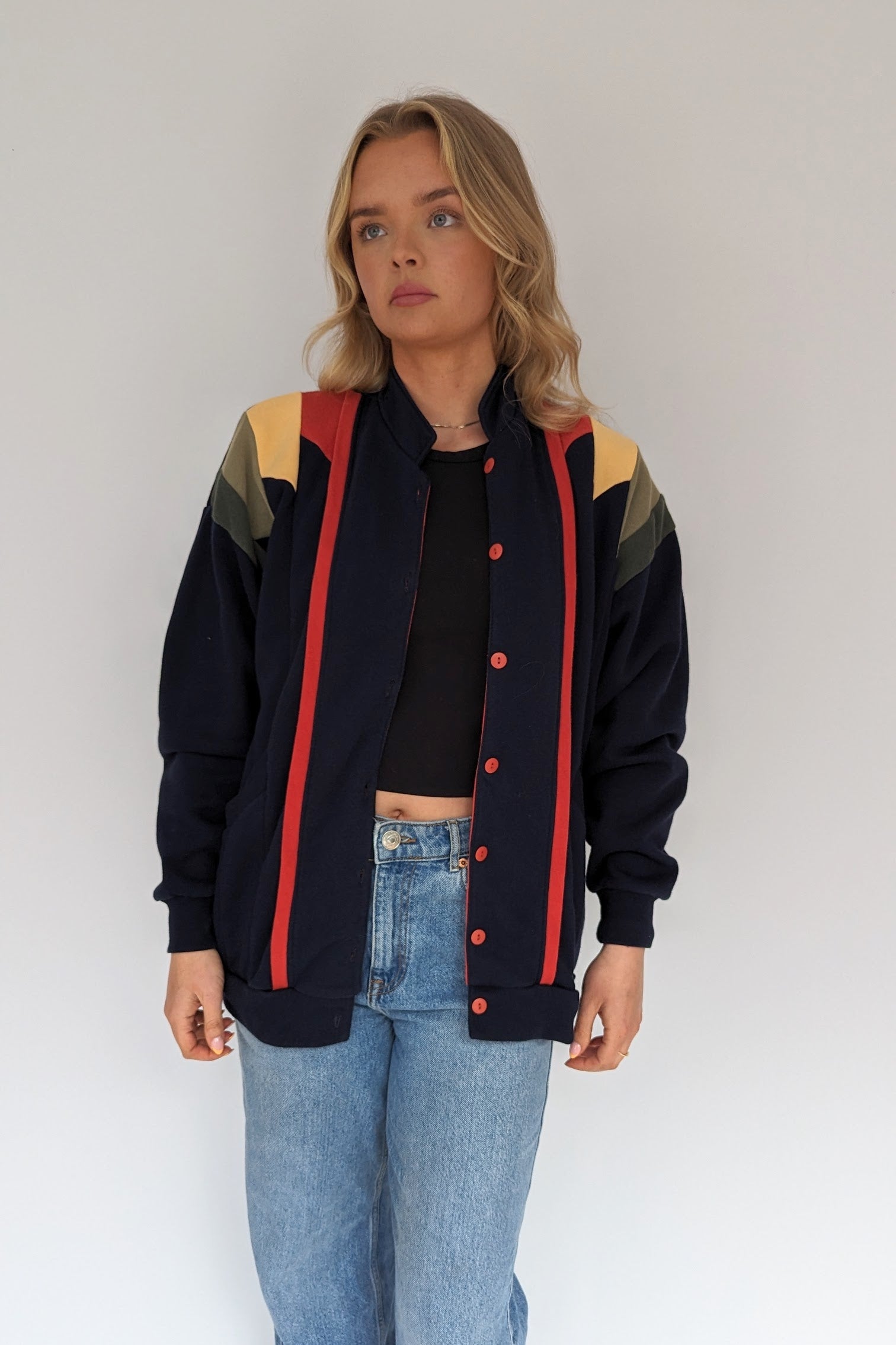 vintage retro jersey cardigan in blue with red, yellow and green panelling 