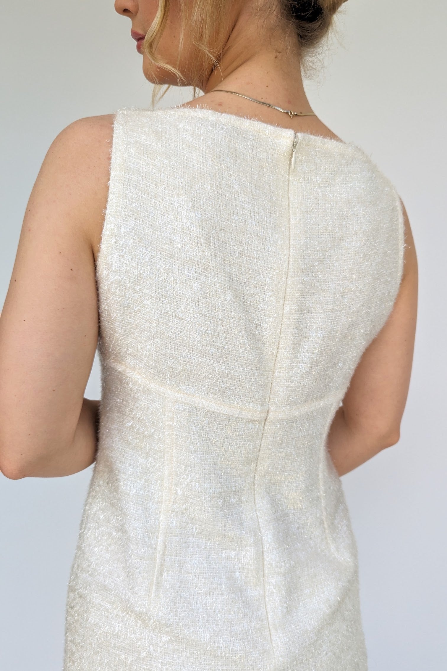 back of white alberta ferretti short fitted evening dress in a sparkly tinsel like fabric