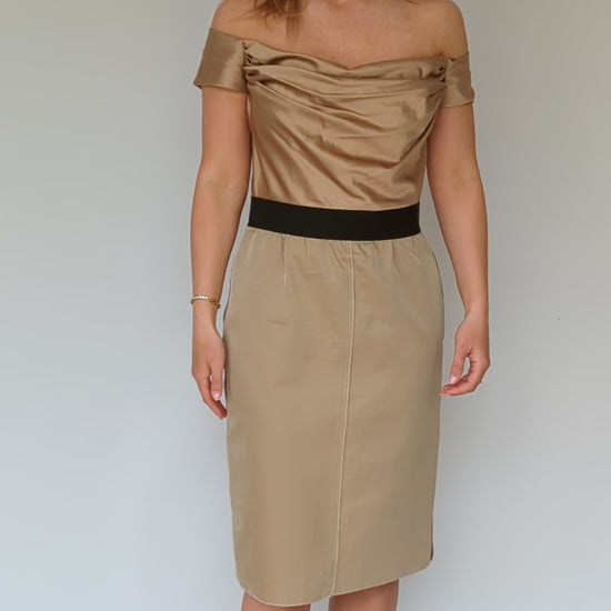 video of gold satin off shoulder dolce & gabbana cocktail dress