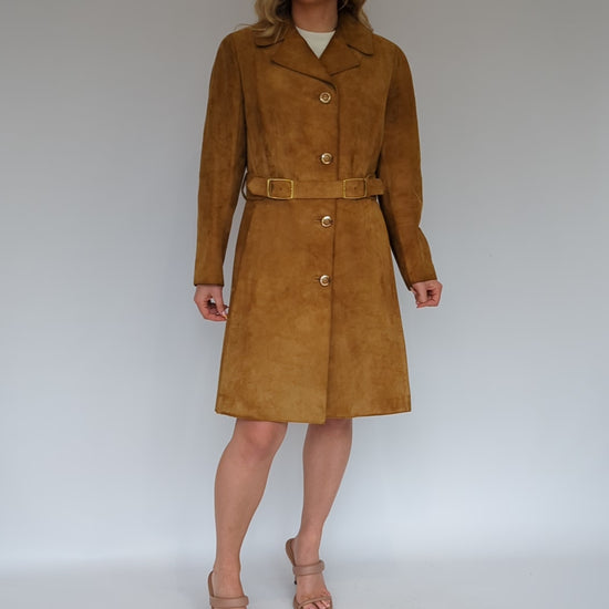 video showing 70s long tan suede ladies coat with gold buttons