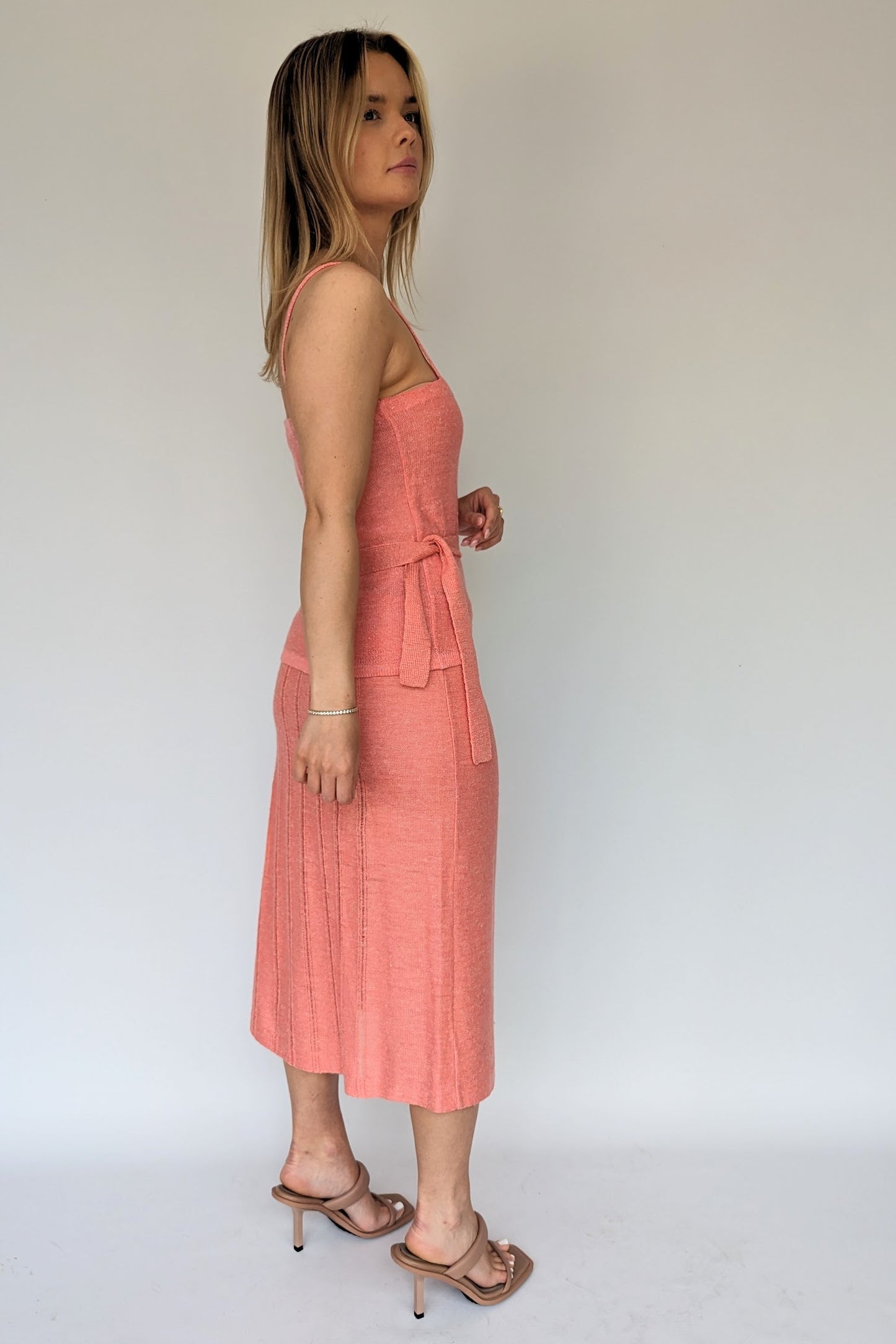 side of 70s christian dior co-ord skirt set in peach with tie 