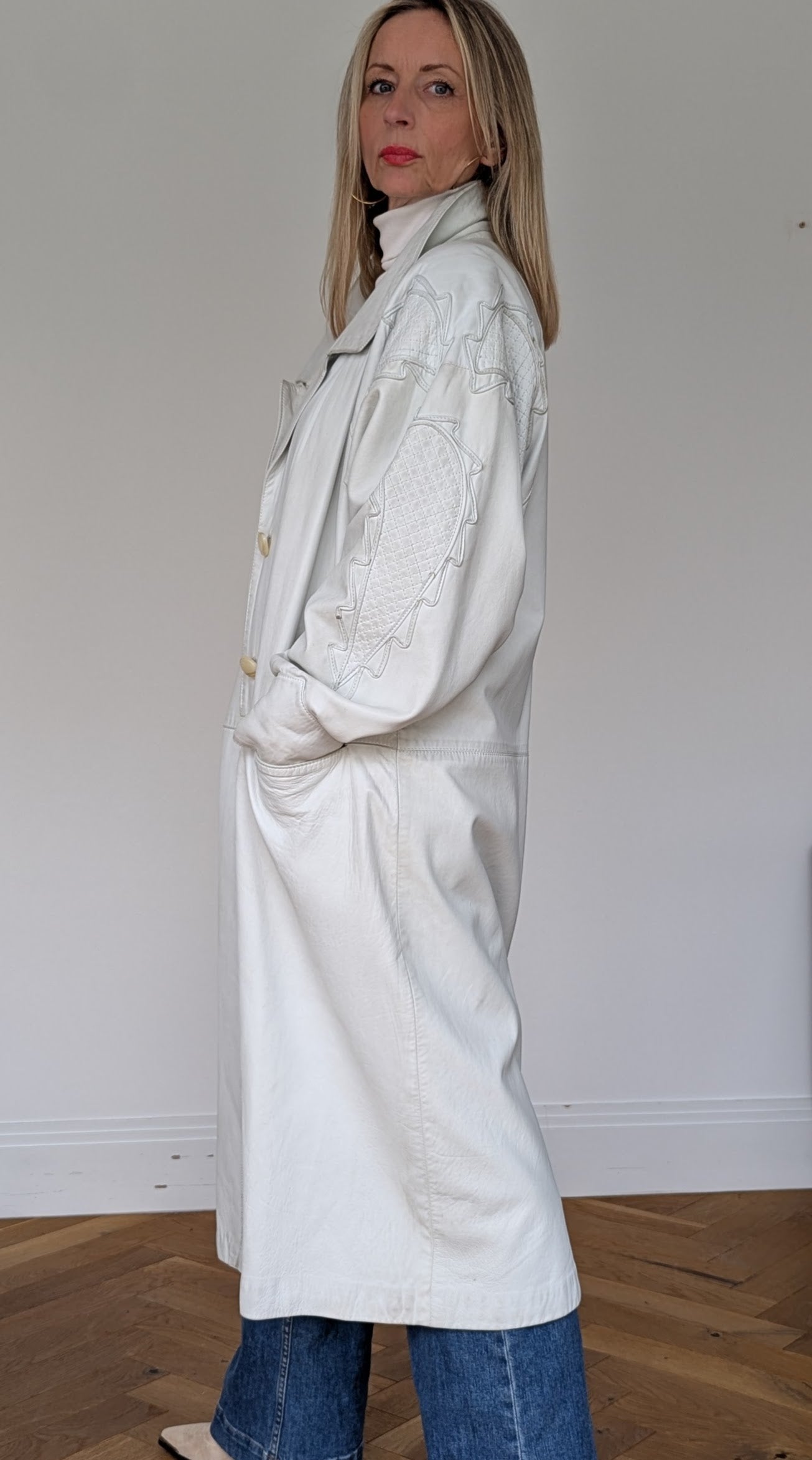 side of 80s vintage leather white coat