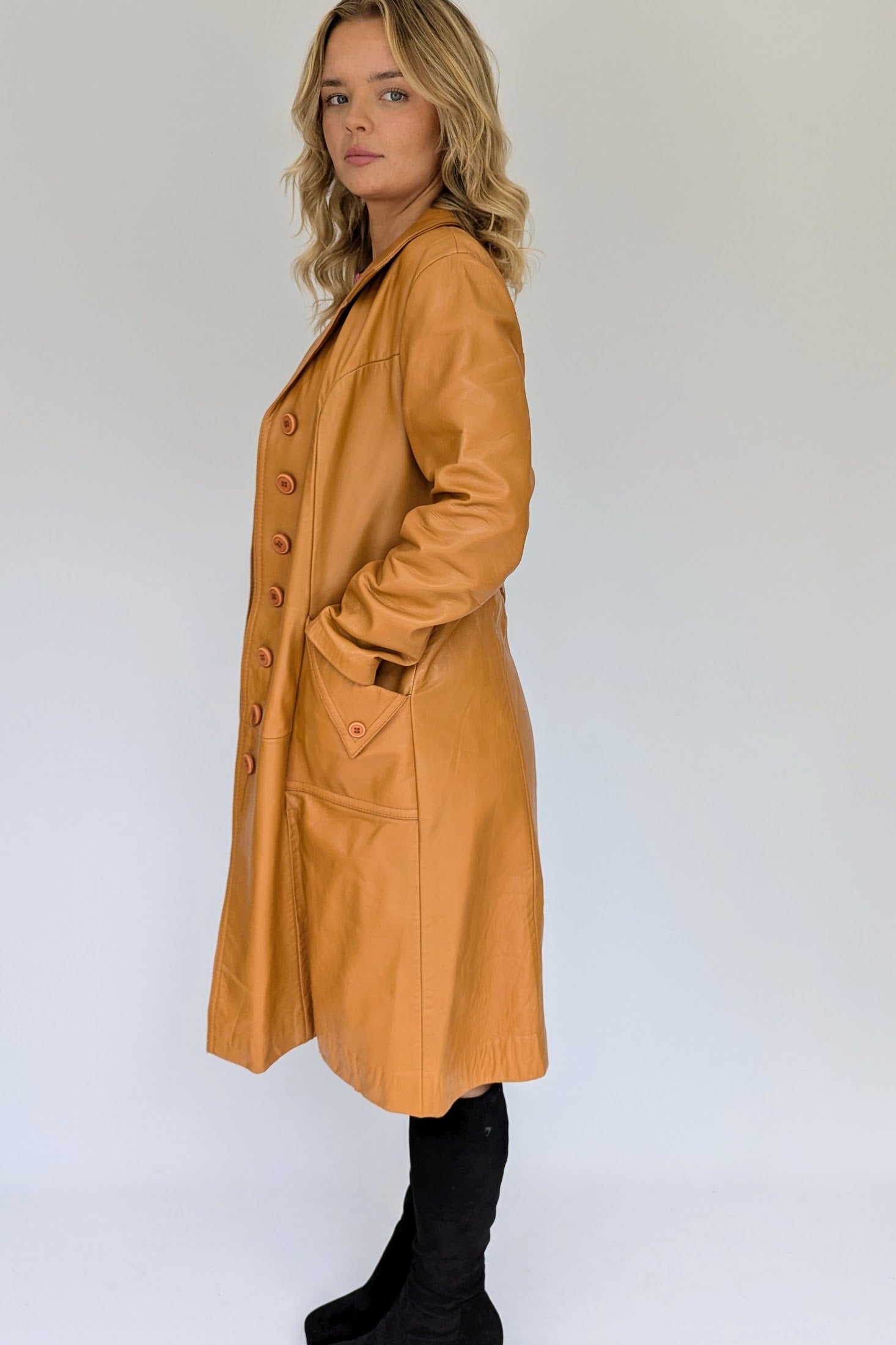 side of brown tan 1970s leather trench coat