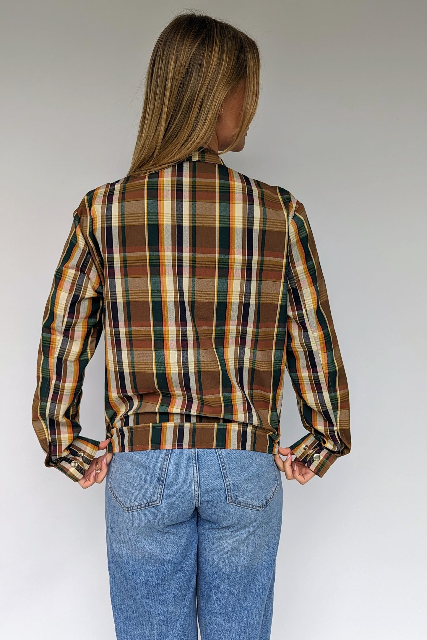 back of casual streetwear checked bomber style jacket  in beige, brown, green and cream 