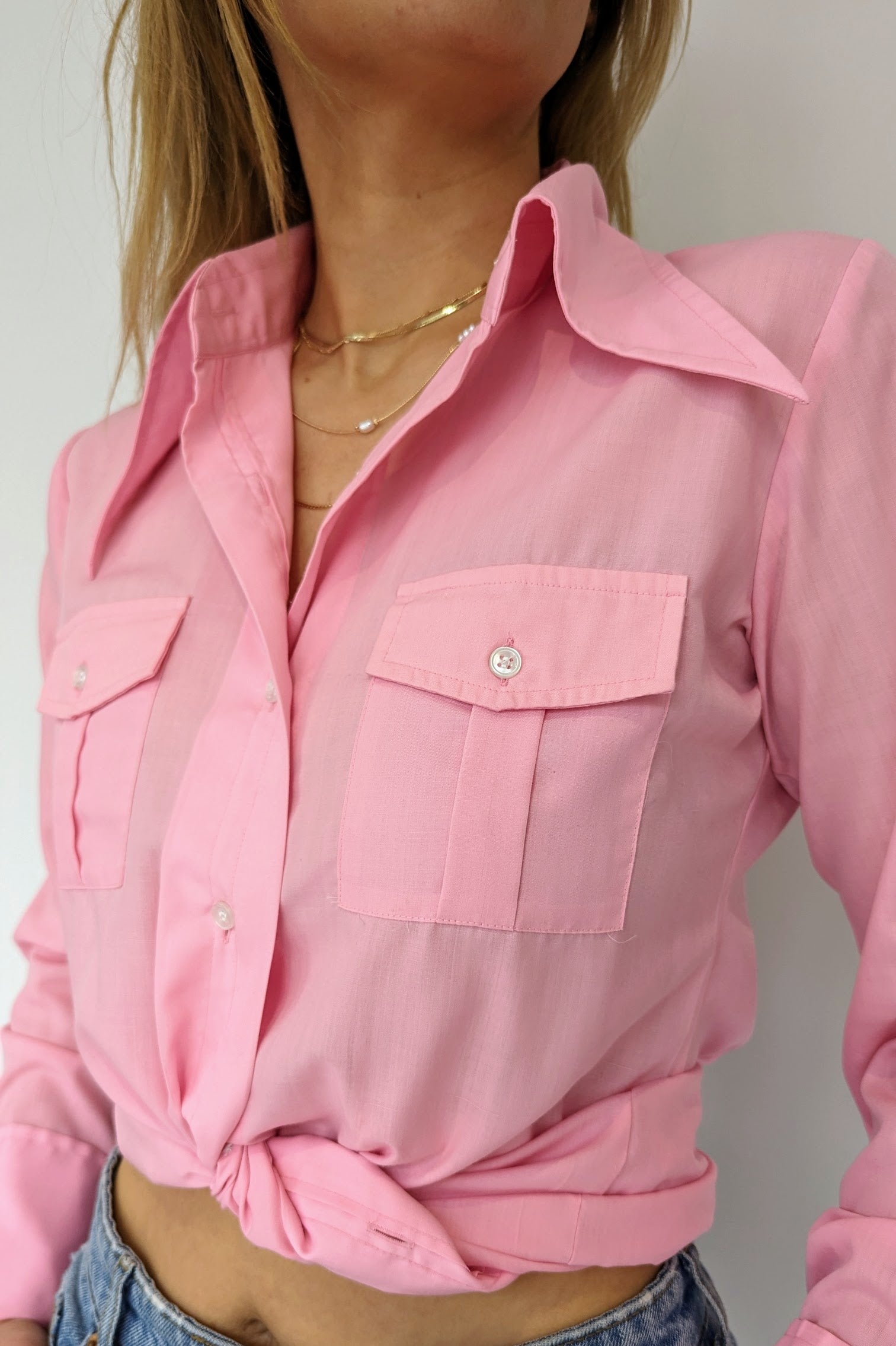 front of tied 70s pink dagger collar long sleeve shirt