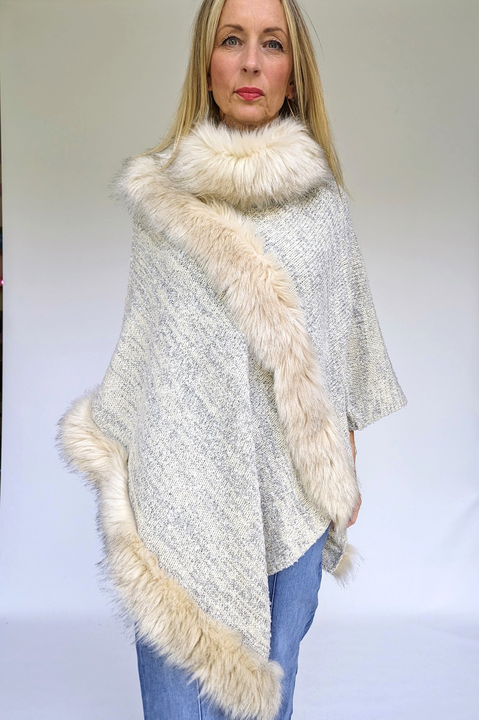 Knitted poncho cape