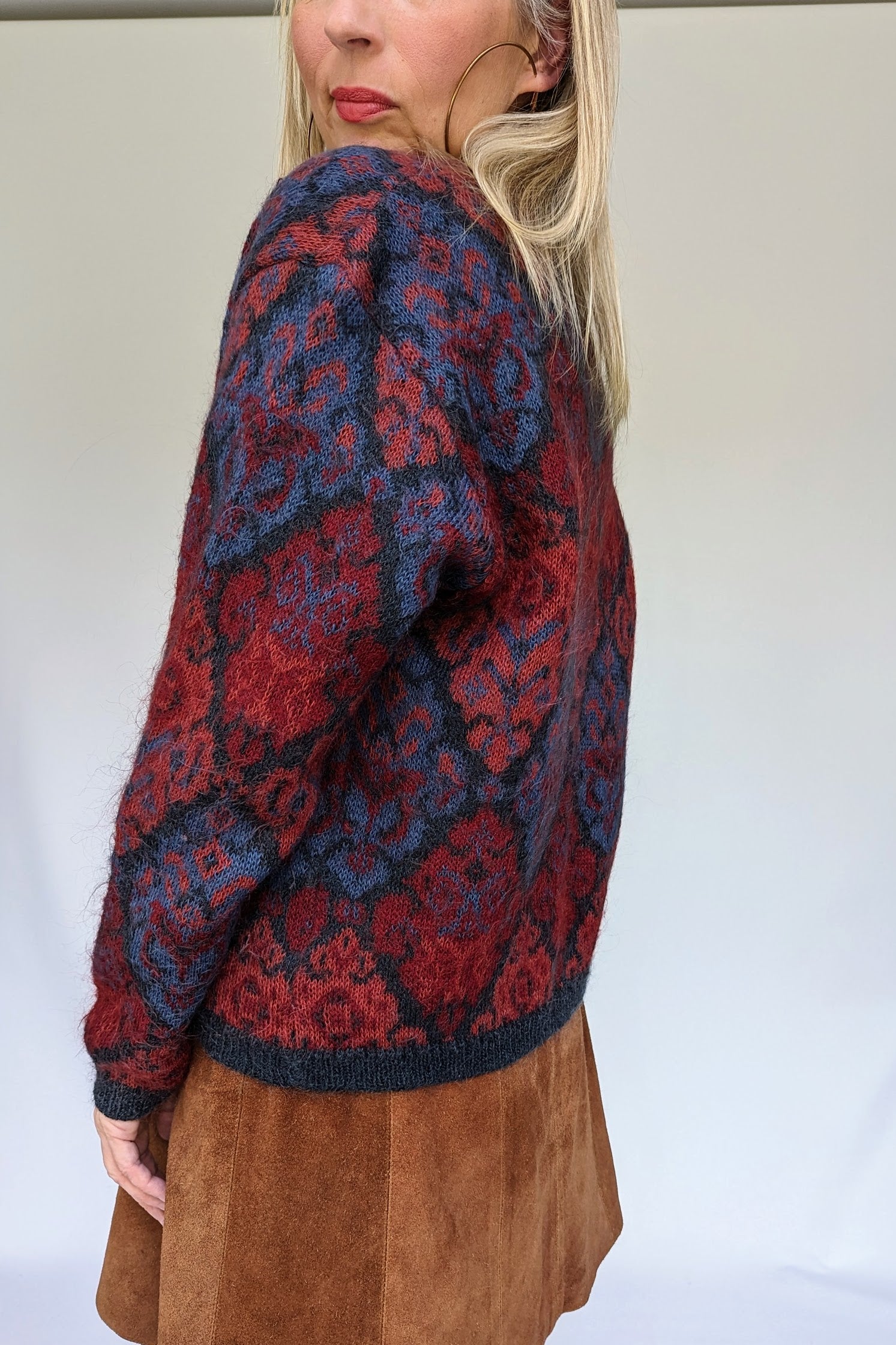 blue pink and red patterned cardigan