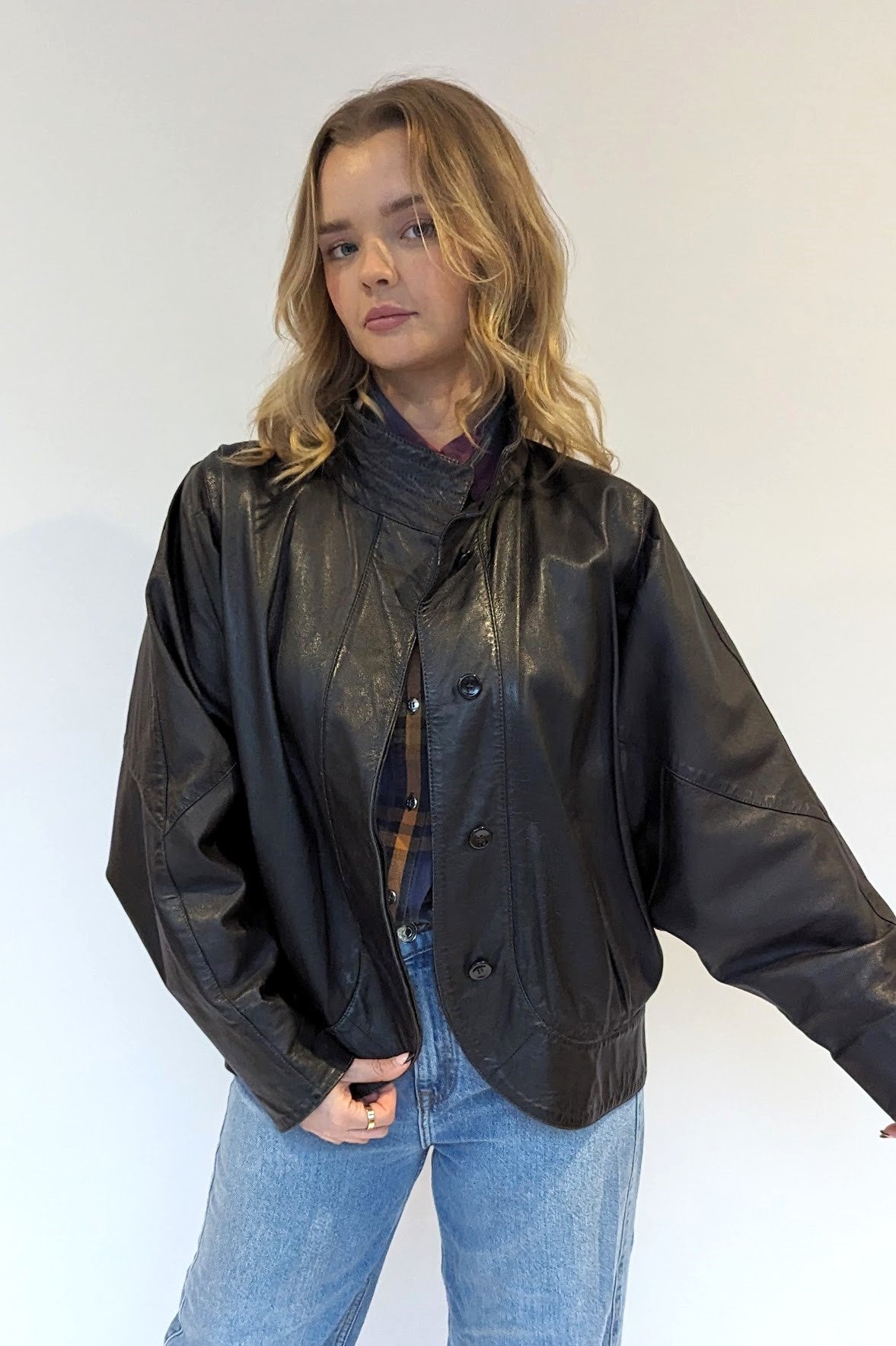 black leather 80s jacket with bat wings