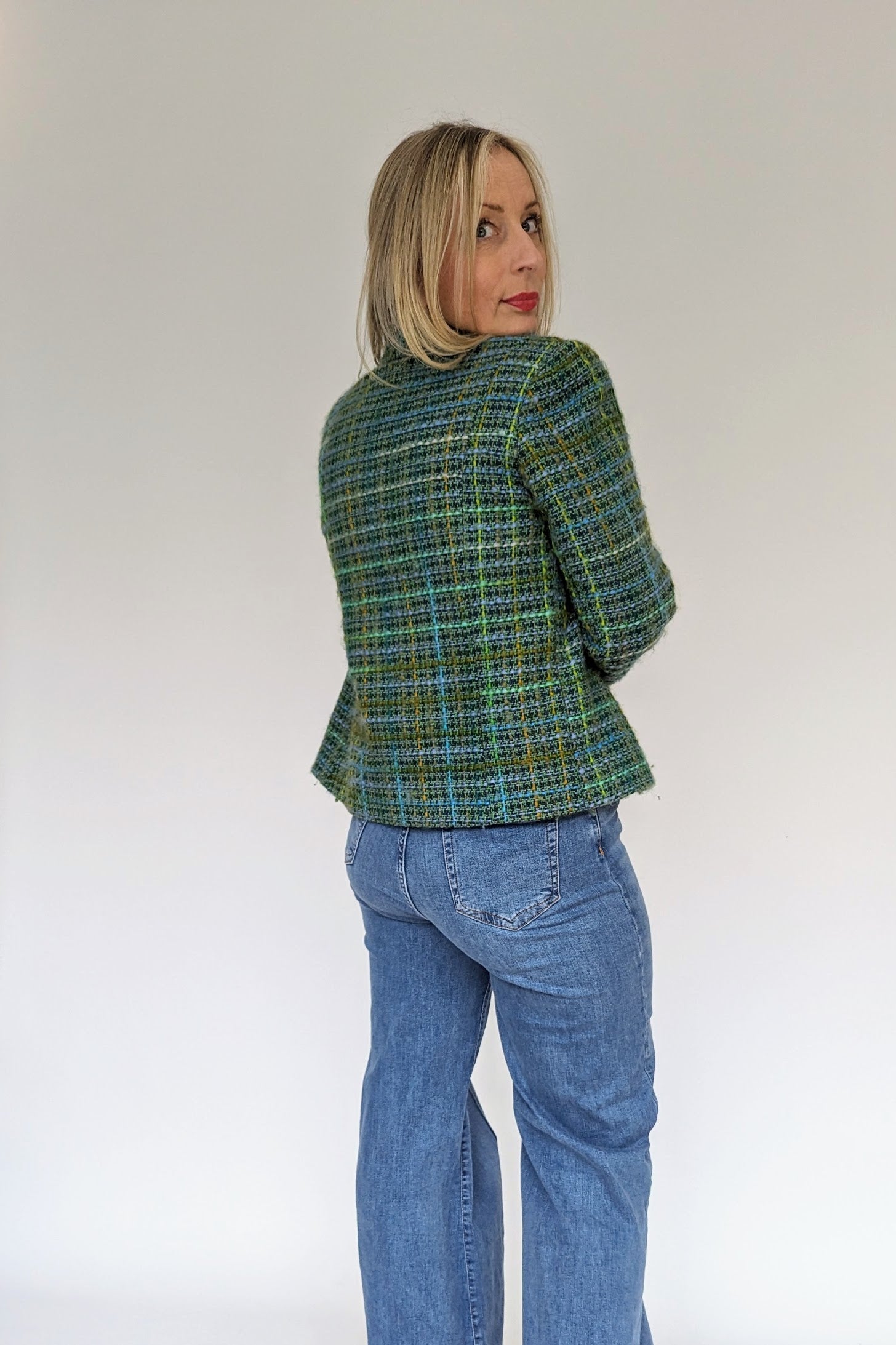 back of vintage green and blue Scottish tweed wool jacket
