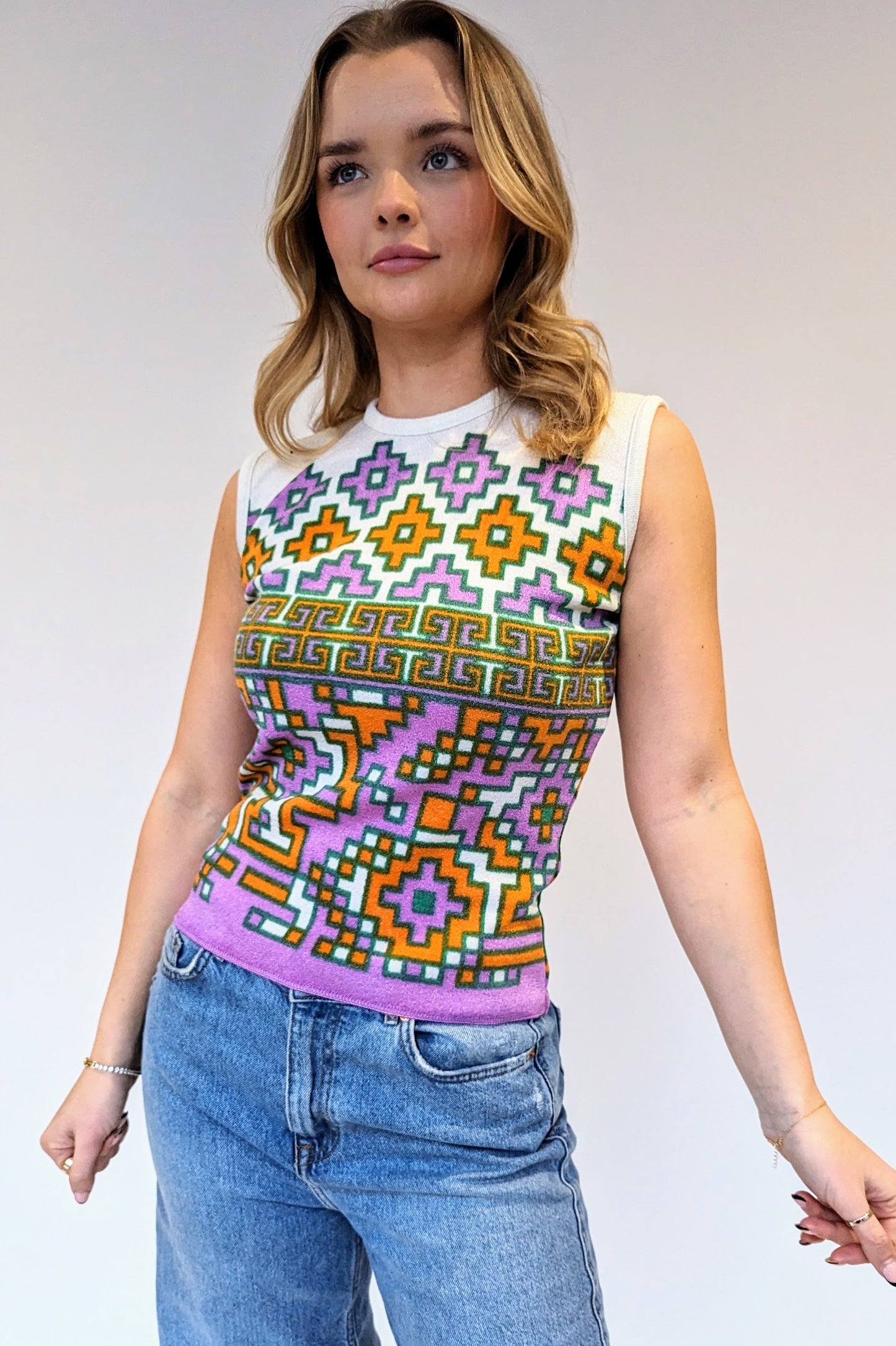 1970s sleeveless top with geometric pattern in green, orange and purple