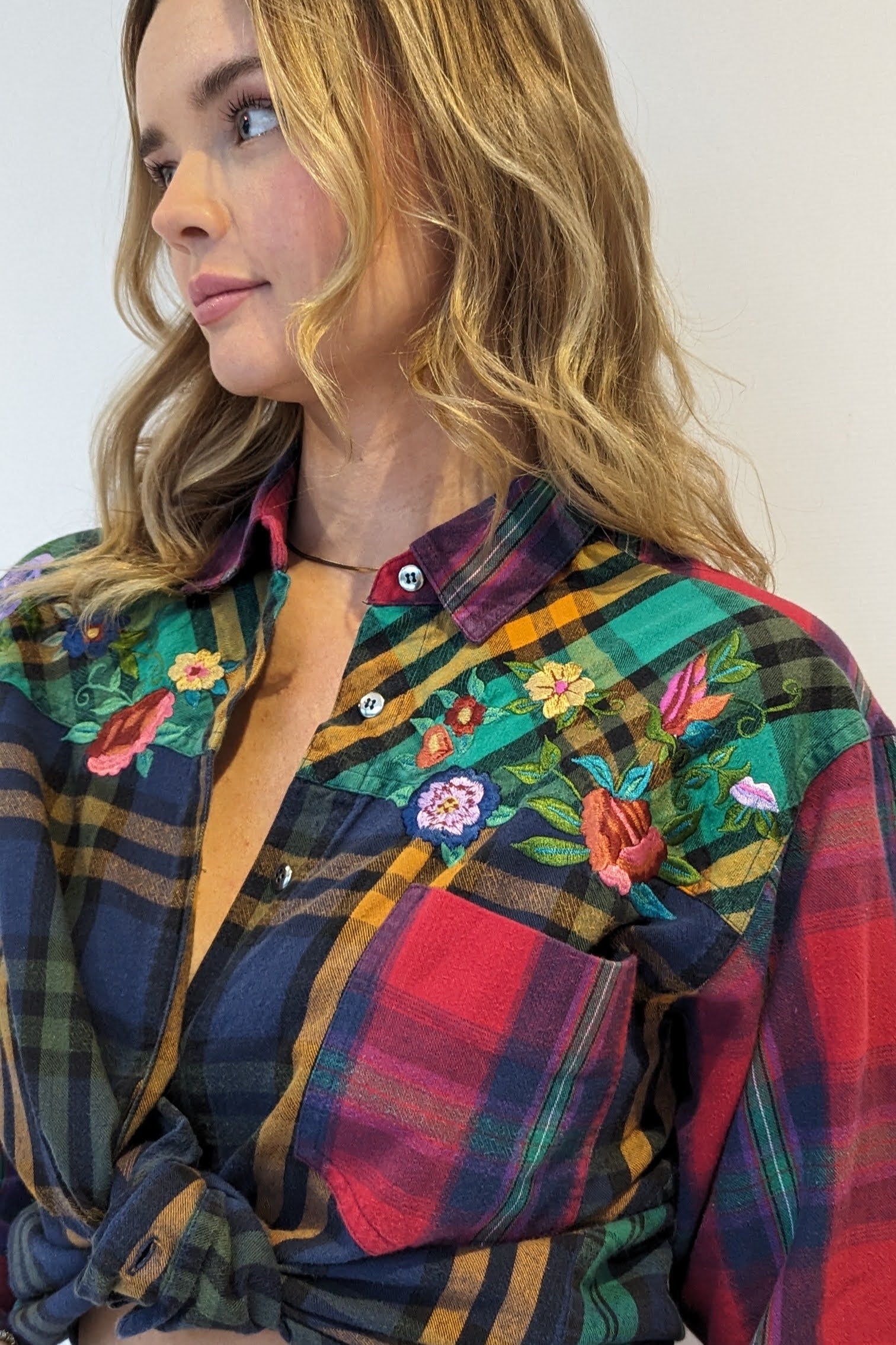 embroidered flowers on plaid shirt
