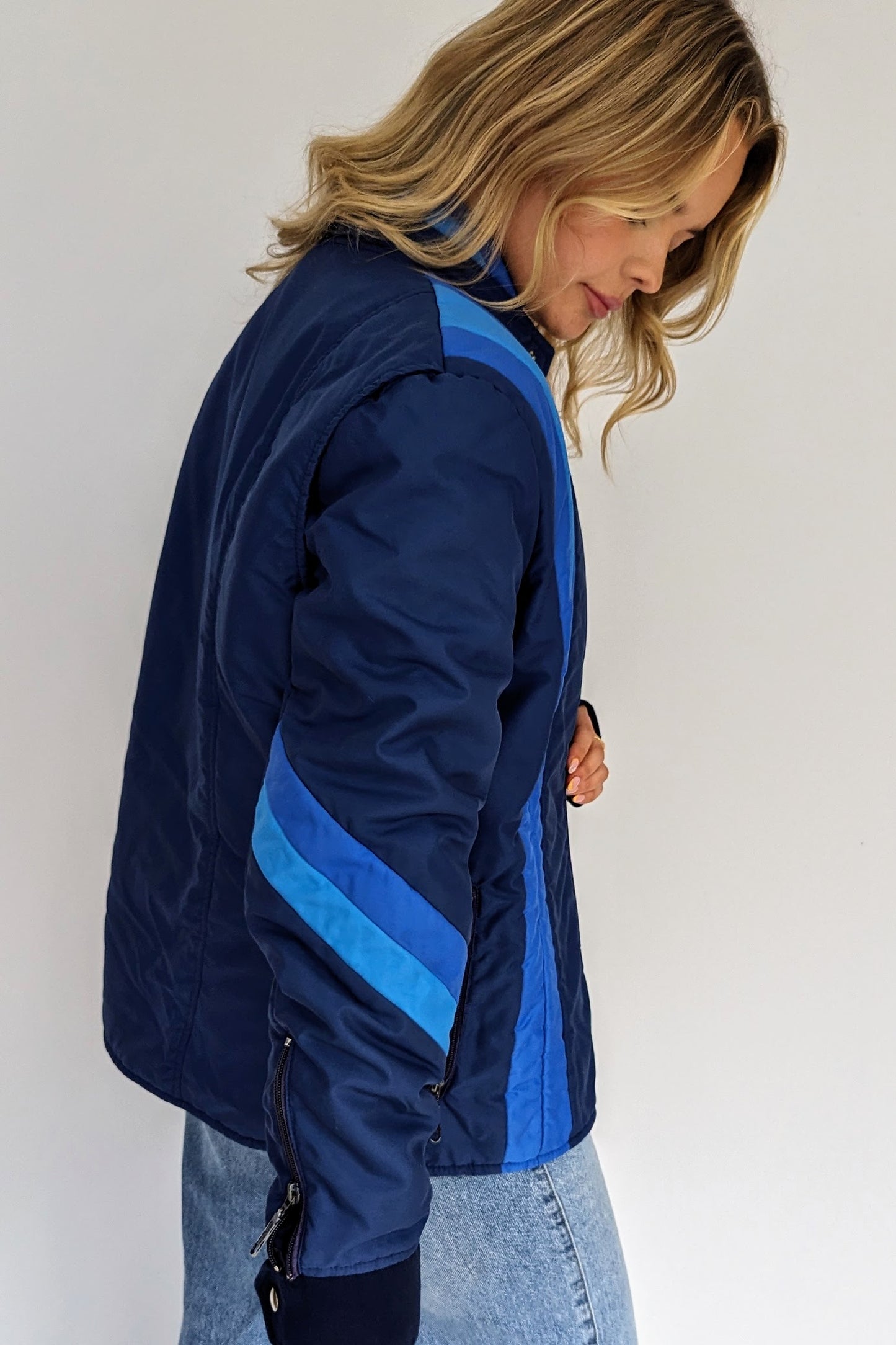 side of retro blue puffer jacket 80s 70s