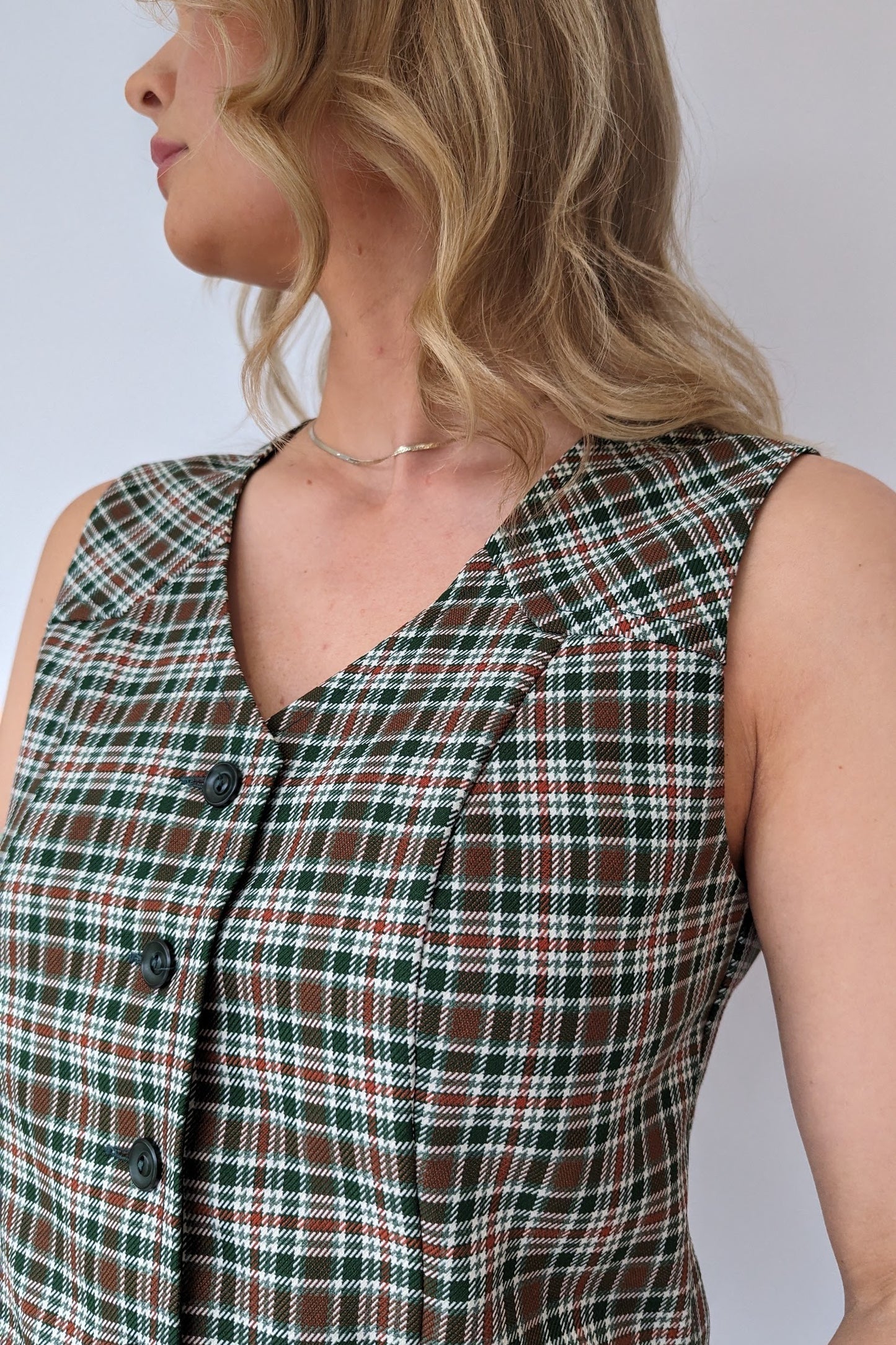 close up of waistcoat from Plaid check skirt suit from 1970s in khaki and brown