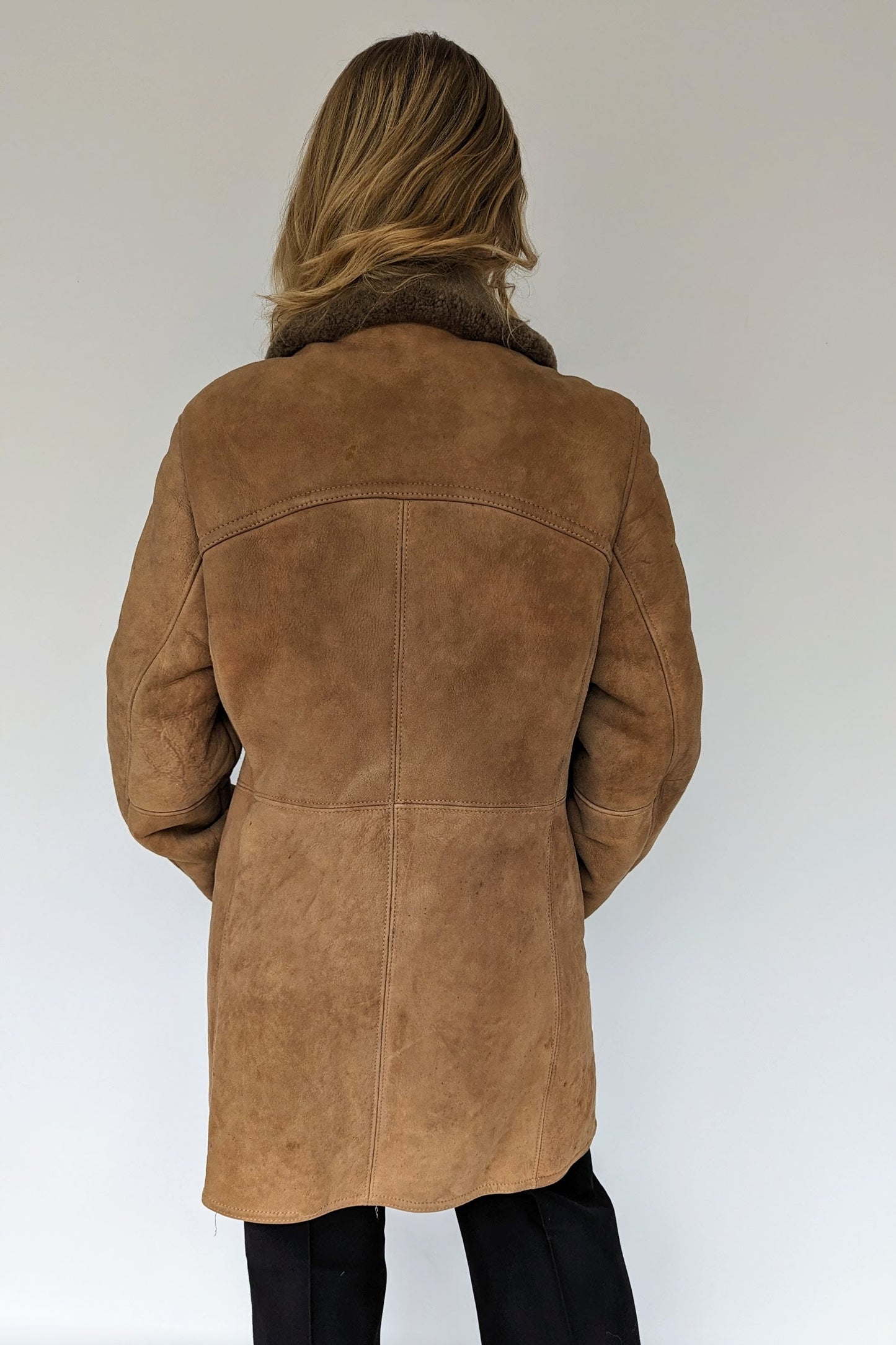 Back of double breasted vintage sheepskin coat