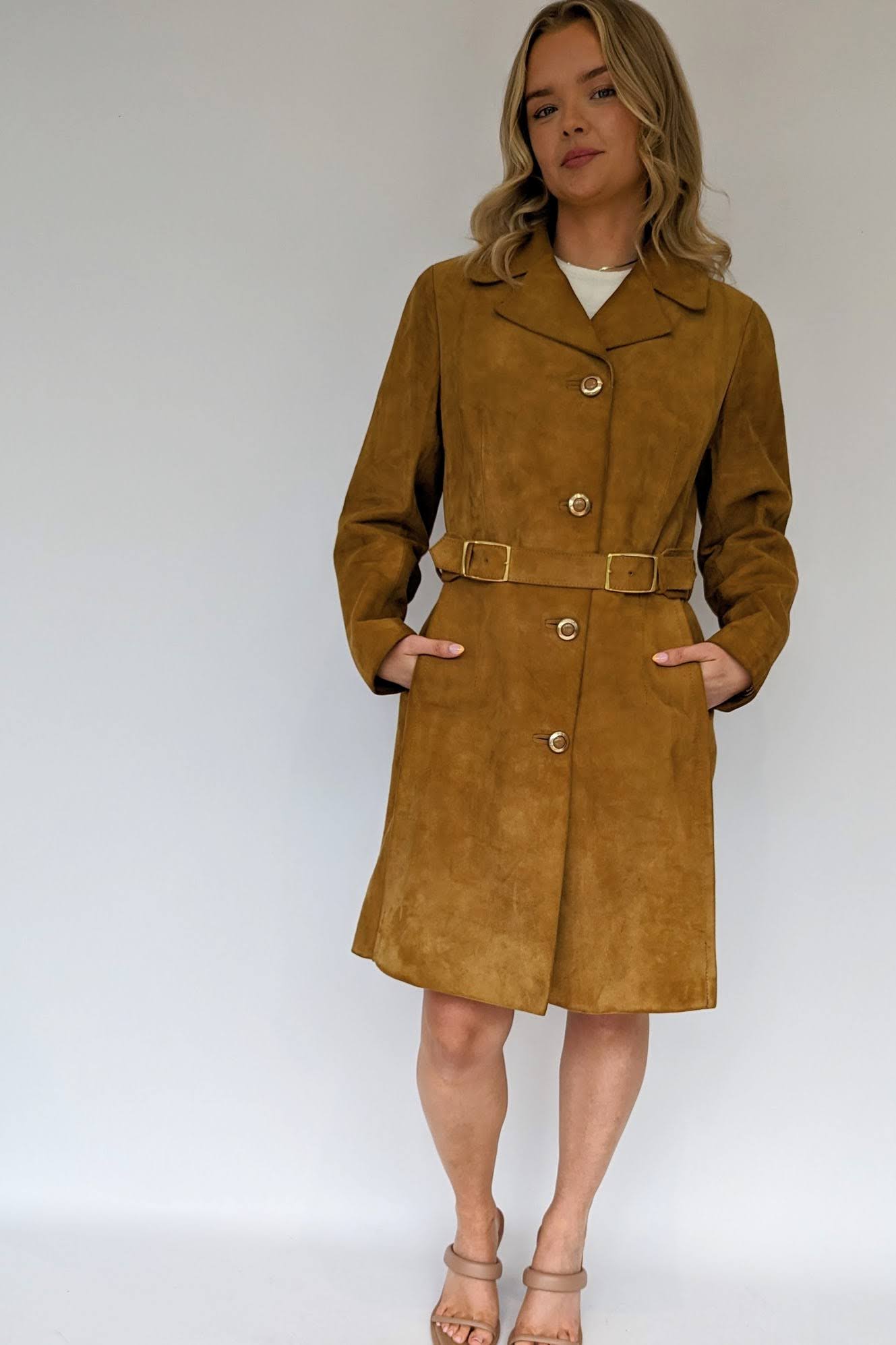 70s long tan suede ladies coat with gold buttons done up